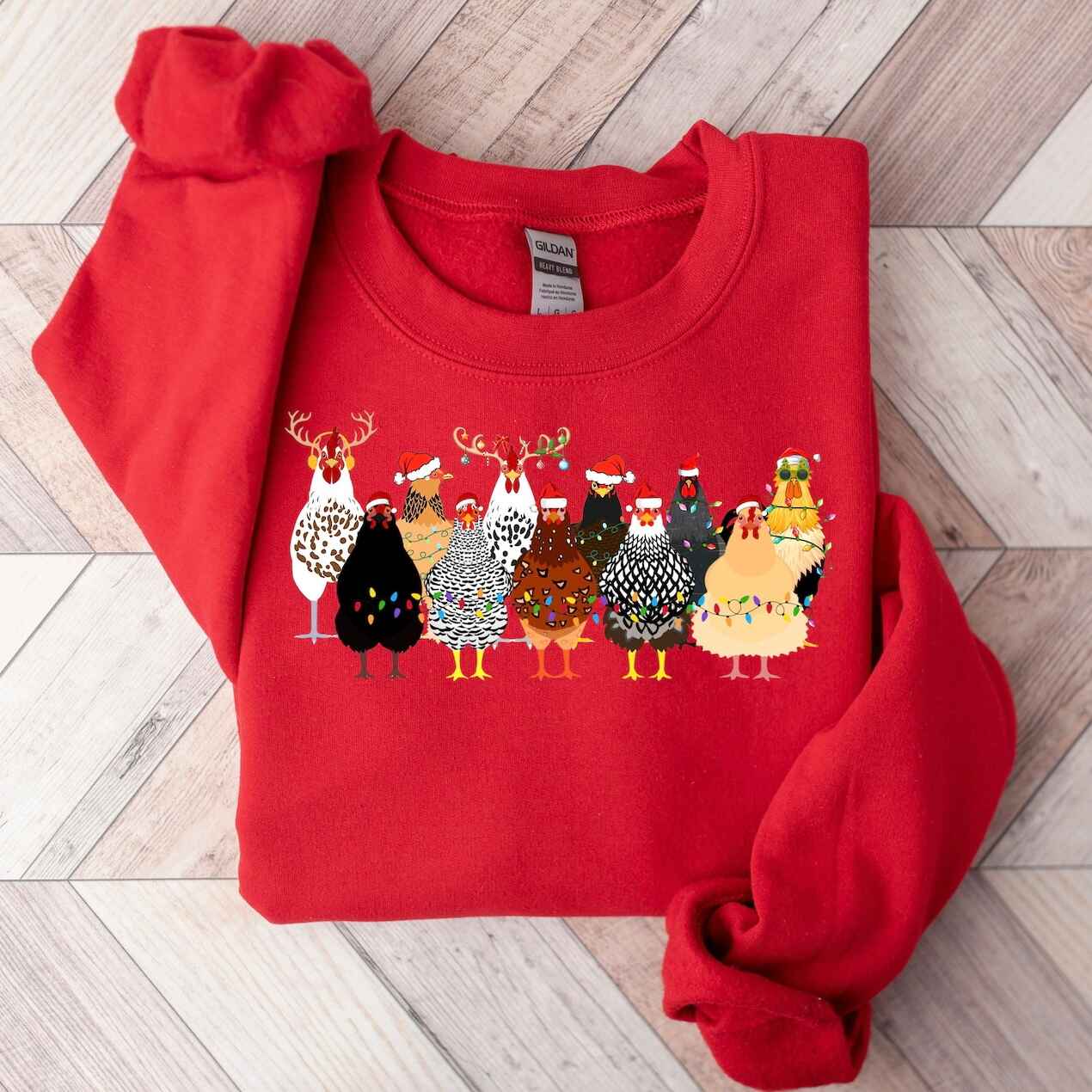 Christmas sweatshirt with festive chicken design in holiday attire
