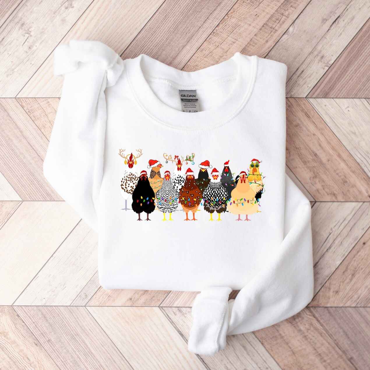 Christmas sweatshirt with festive chicken design in holiday attire
