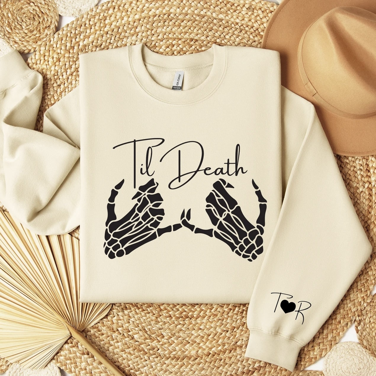 Eternal love graphic sweatshirt featuring skeleton hands and text