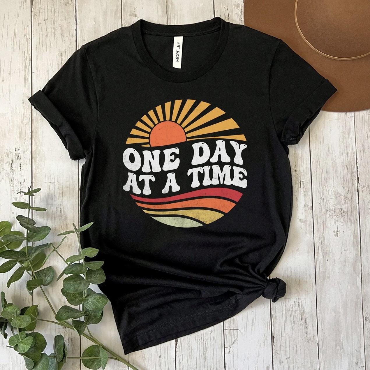 Black retro 'One Day at a Time' t - shirt with sun graphic