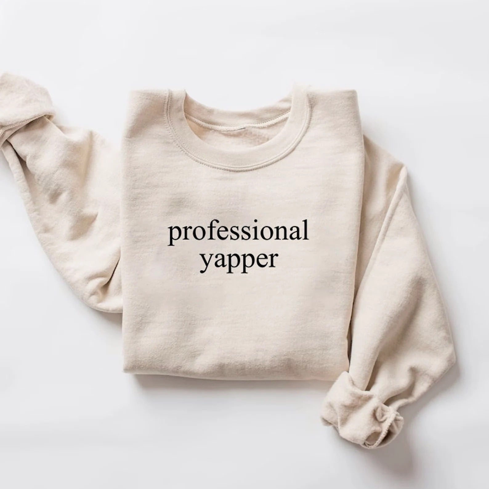 Stylish gray "Professional Yapper" sweatshirt laid flat