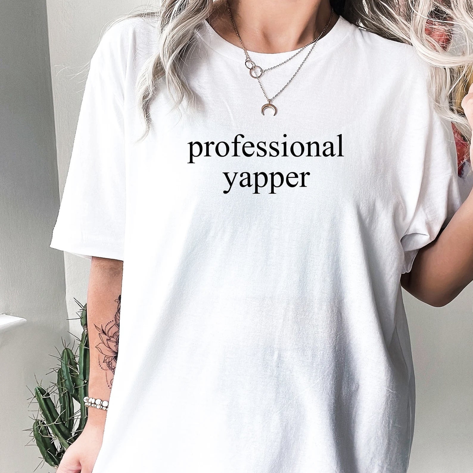 Cozy white "Professional Yapper" sweatshirt with bold text design