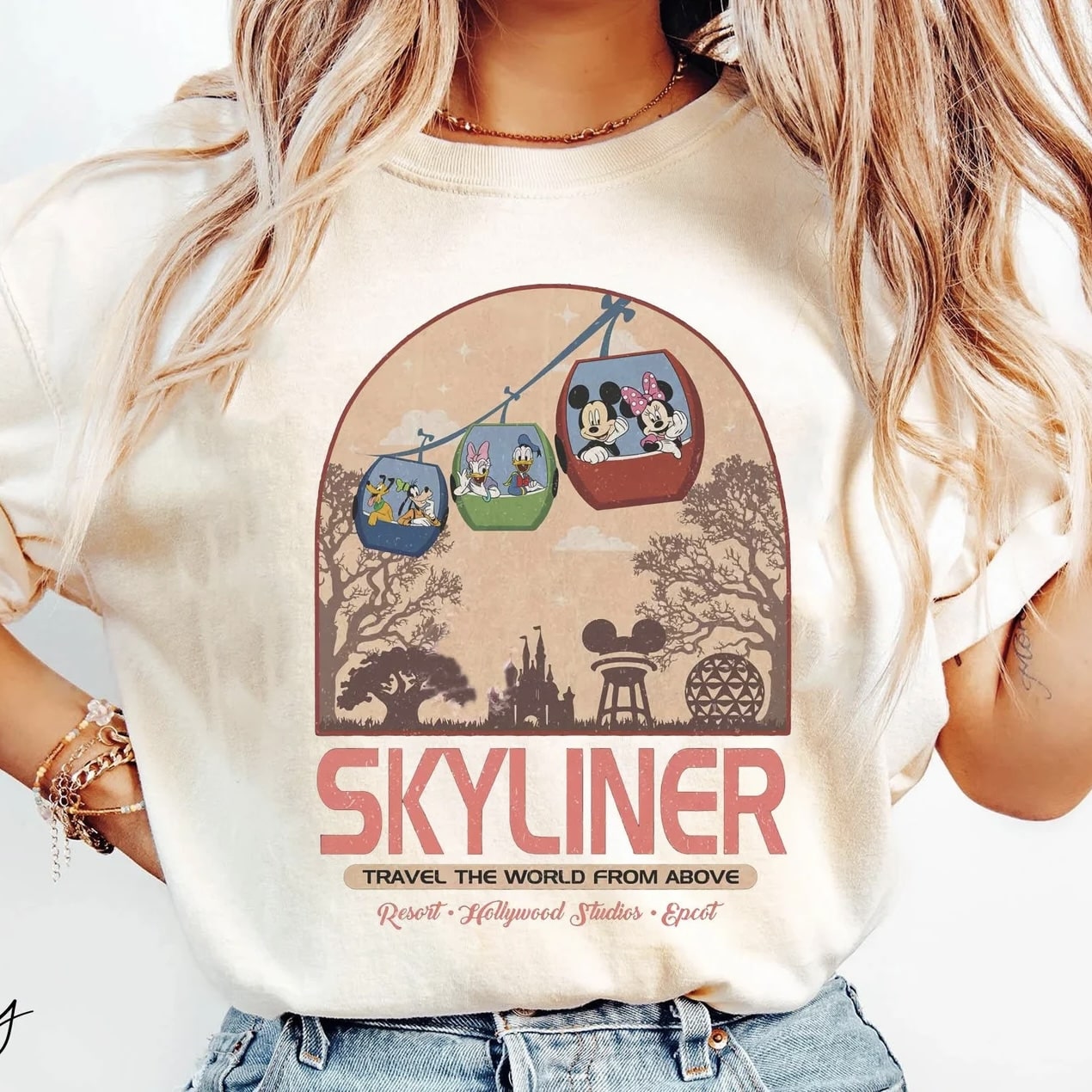 Retro Disney Skyliner graphic tee with Mickey, Minnie, Donald, and Daisy