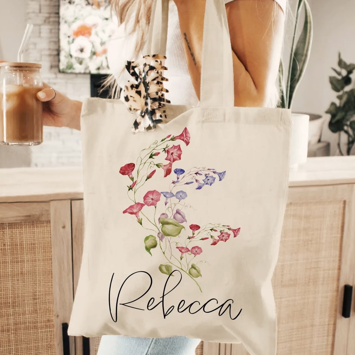 Eco-friendly canvas tote featuring birth month flower and name customization.