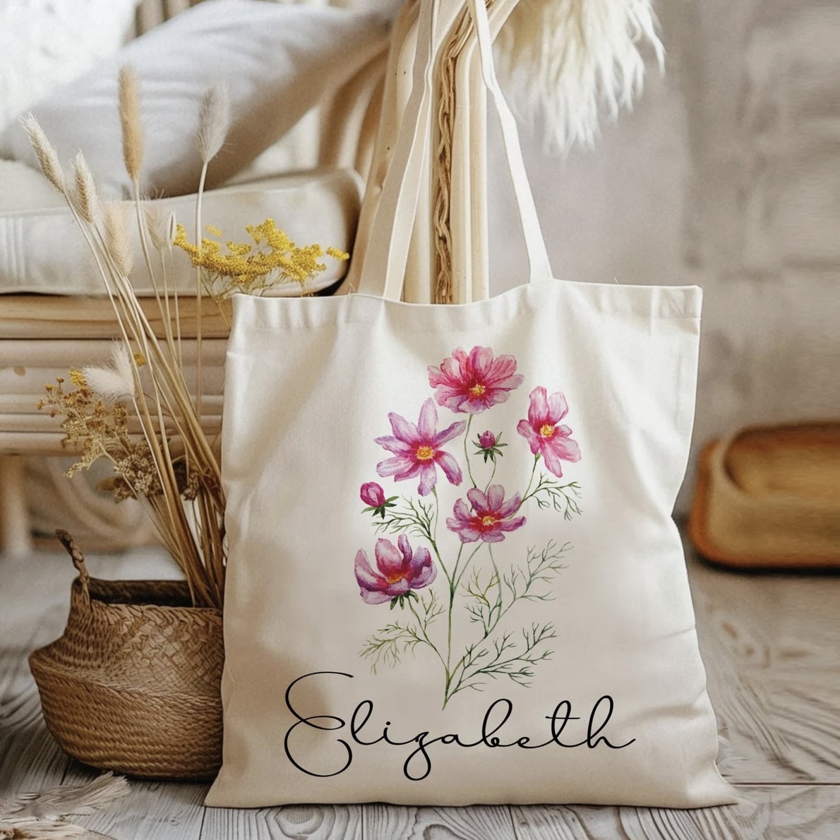 Customizable canvas tote bag with delicate birth flower line art and name.