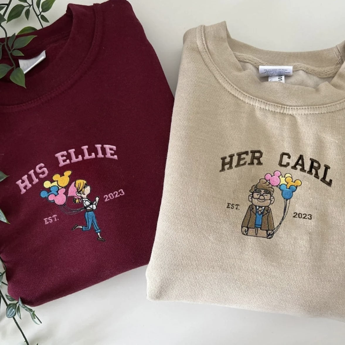 His Ellie and Her Carl Couple Hoodies with embroidered designs and colorful balloons.