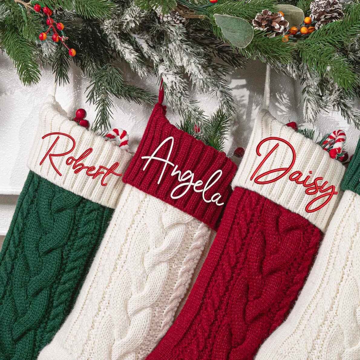 Green, cream, and red embroidered family stockings for holiday décor.
