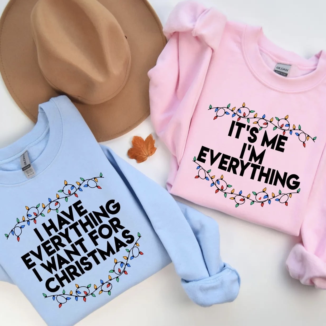 "I Have Everything I Want for Christmas" and "It’s Me, I’m Everything" couple sweatshirts.