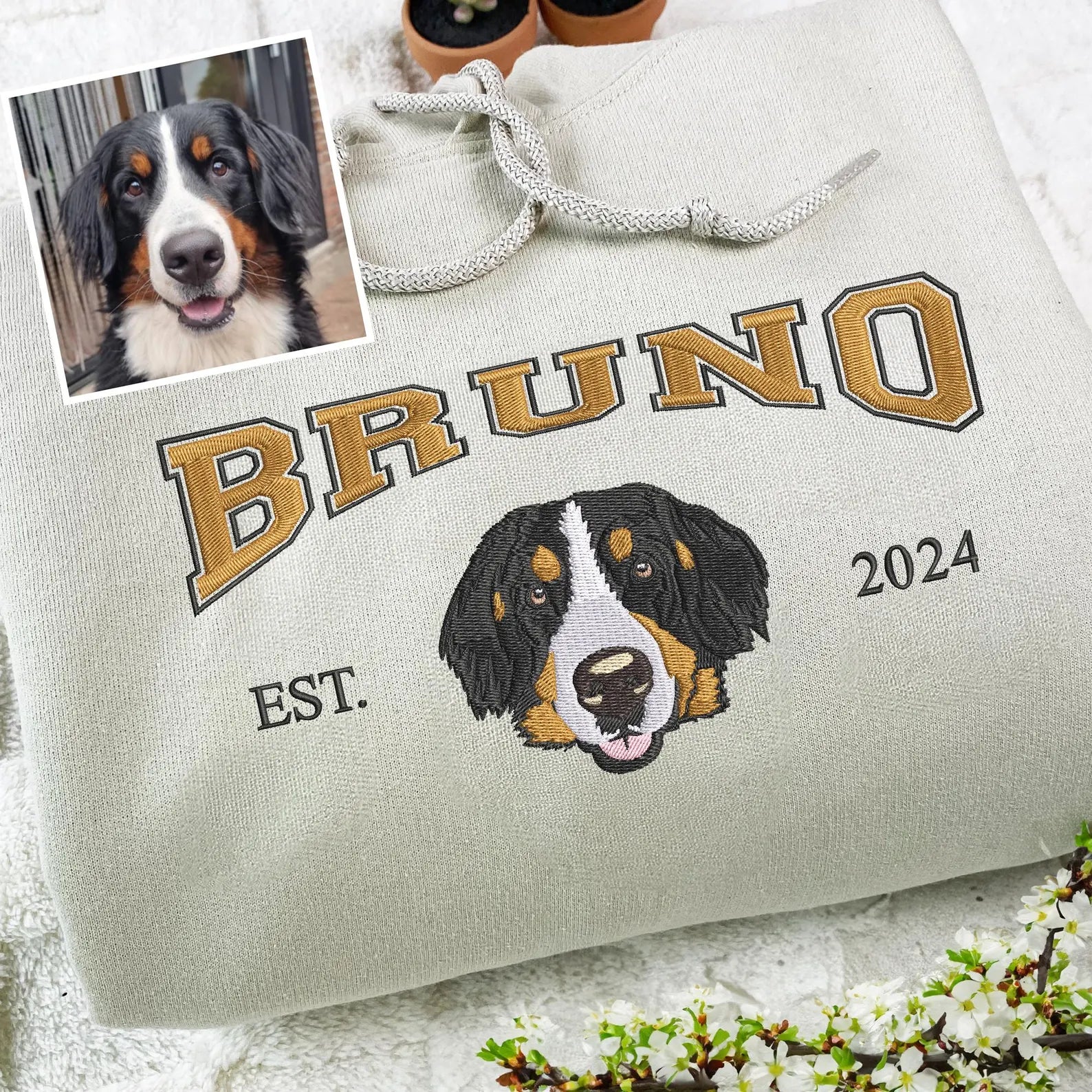 Personalized pet sweatshirt featuring detailed embroidery and EST date