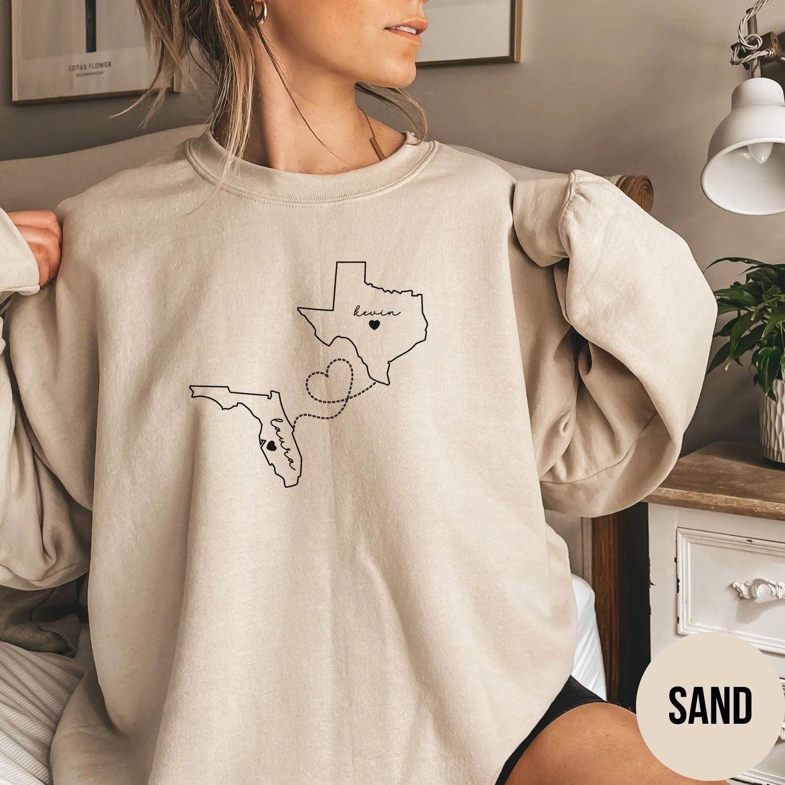 Personalized long-distance sweatshirt with custom state-to-state design and names.