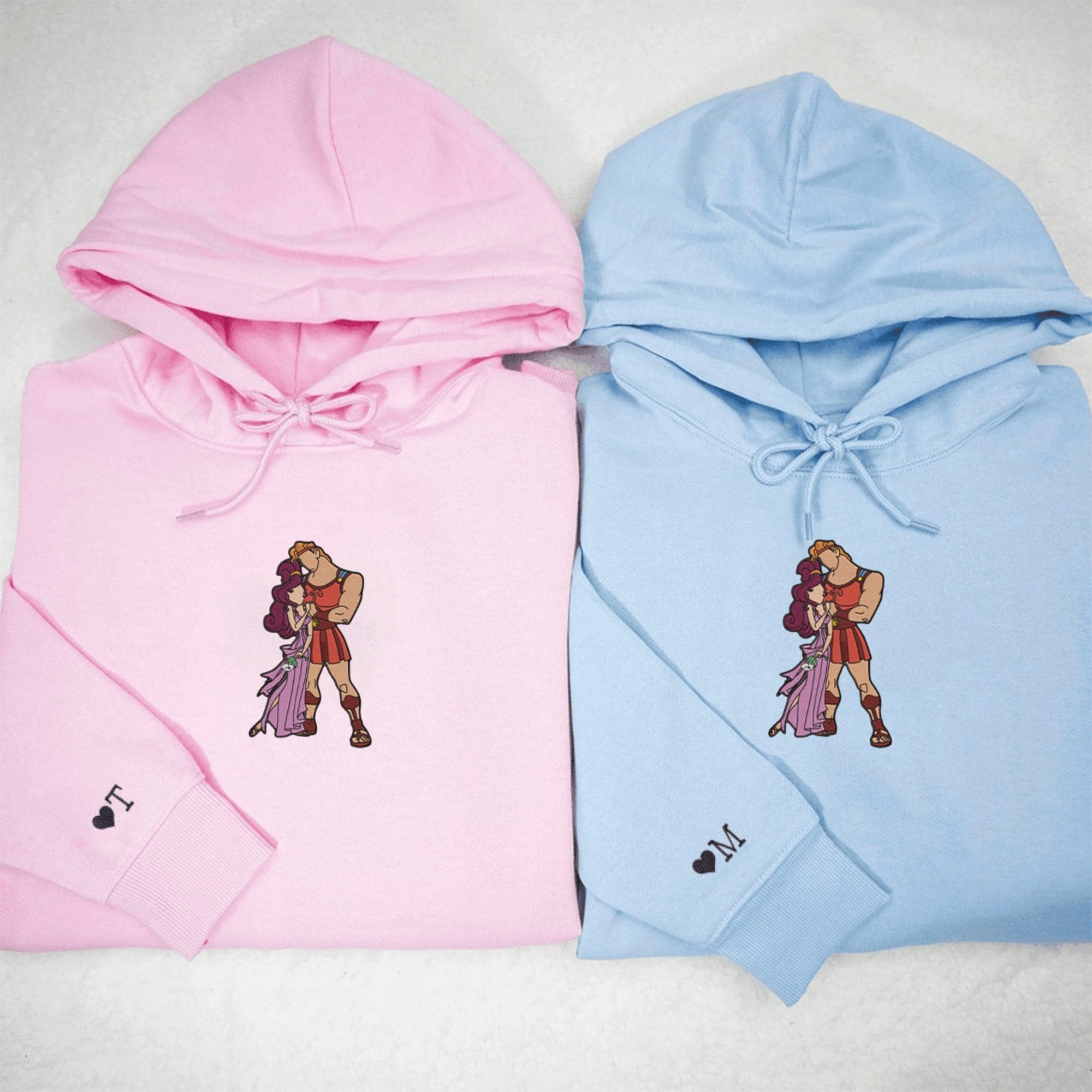 Hercules and Megara couple hoodies showcasing Greek mythology love.

