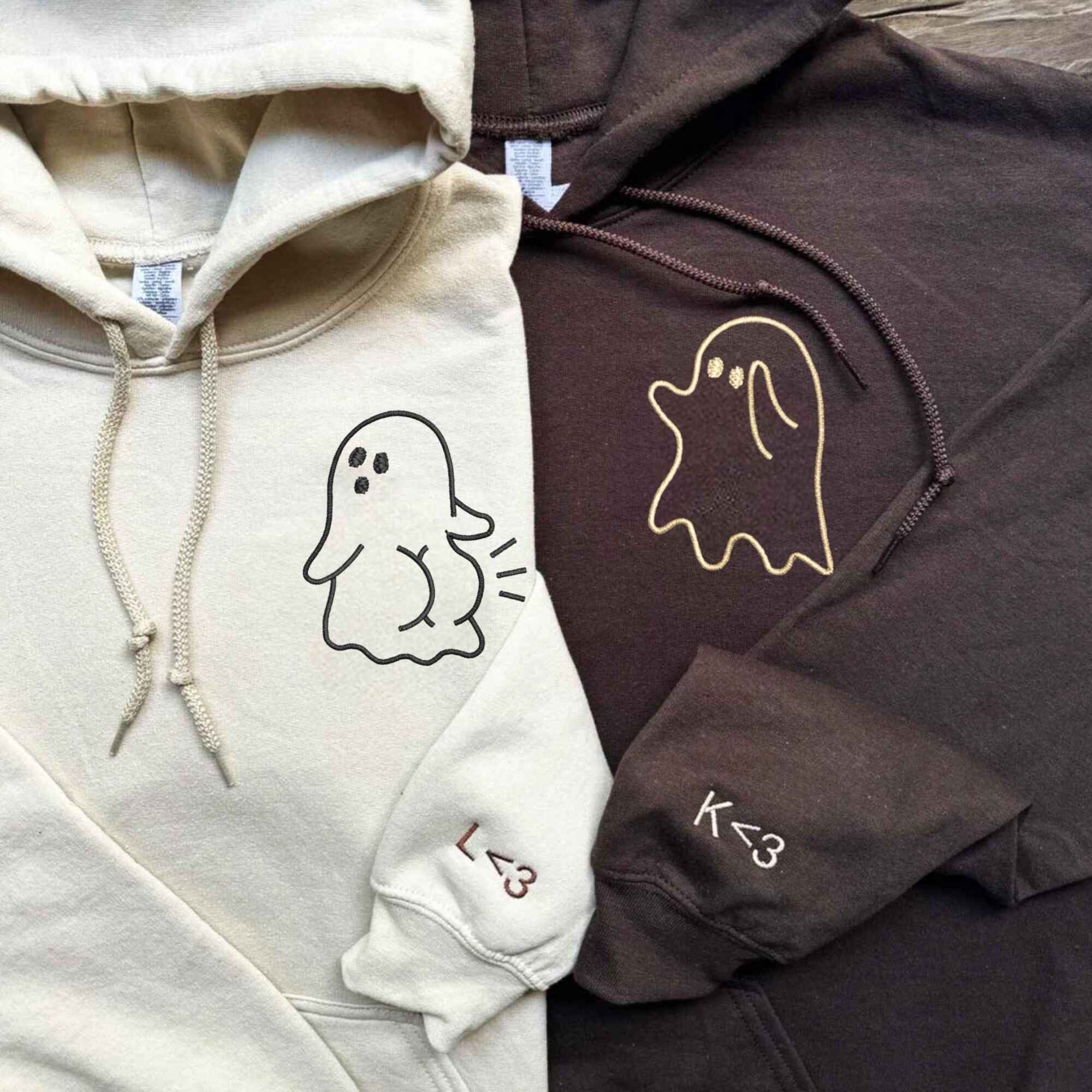 Matching Couple Hoodies with custom embroidered matching couple sweatshirts in playful ghost style.
