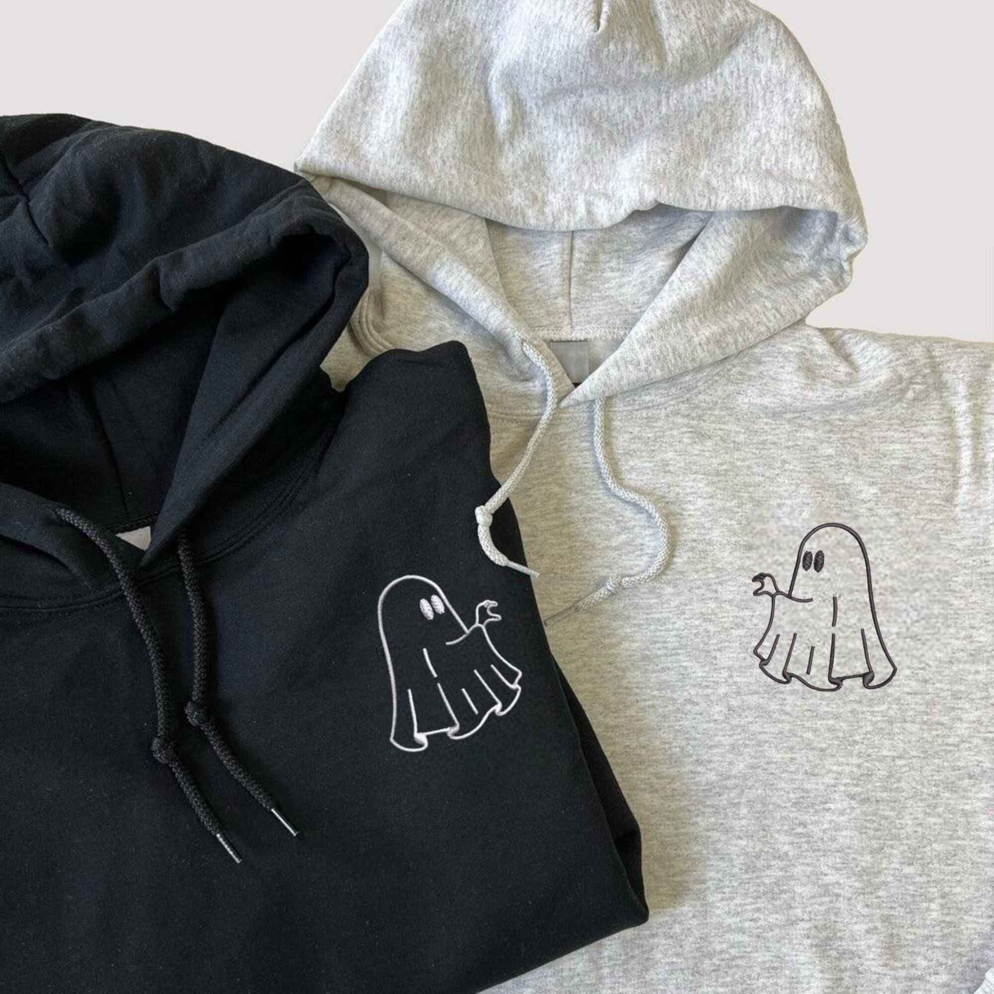 Matching Couple Hoodies with custom embroidered matching couple sweatshirts for Halloween.
