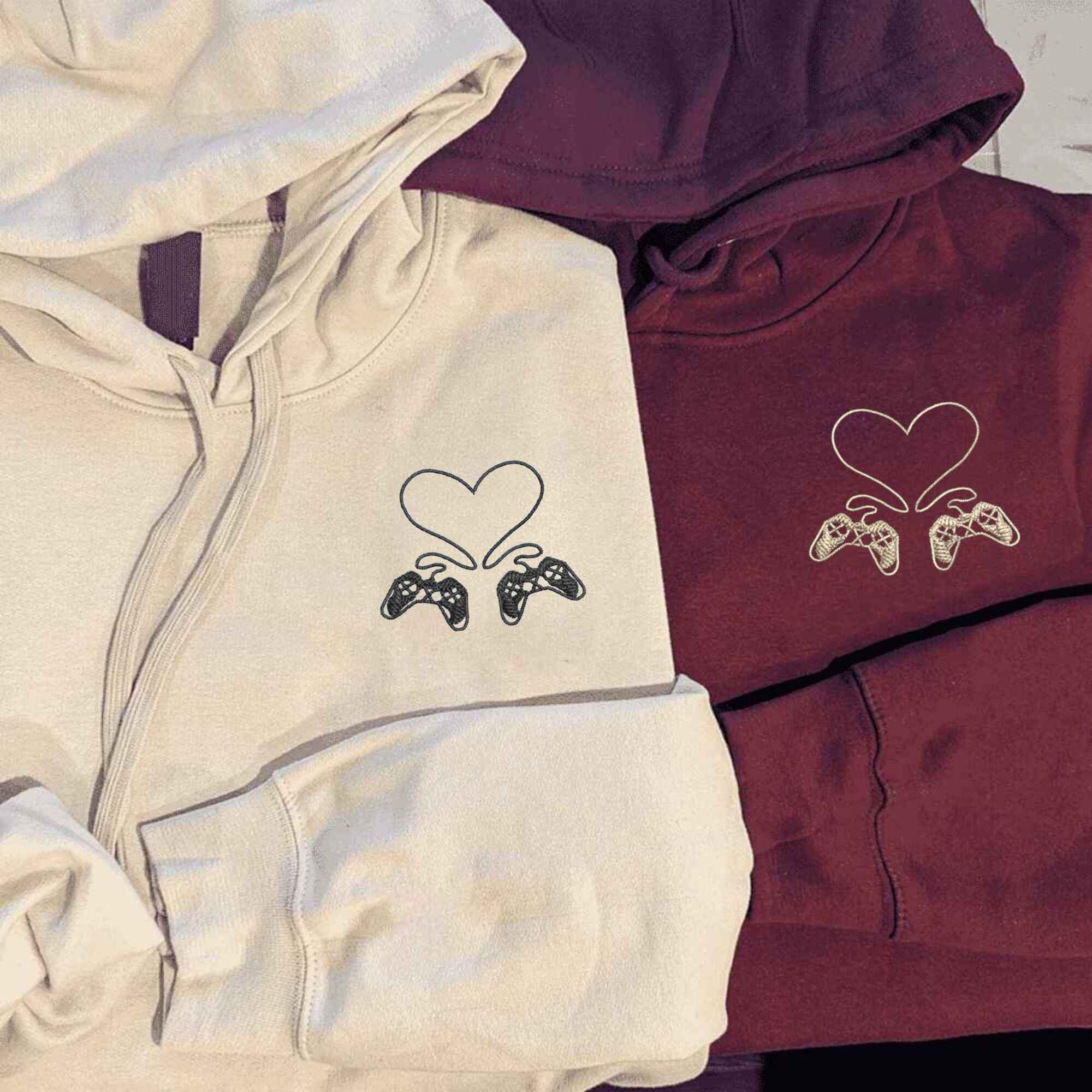 Matching Couple Hoodies with custom embroidered matching couple sweatshirts showcasing playful gaming controllers.
