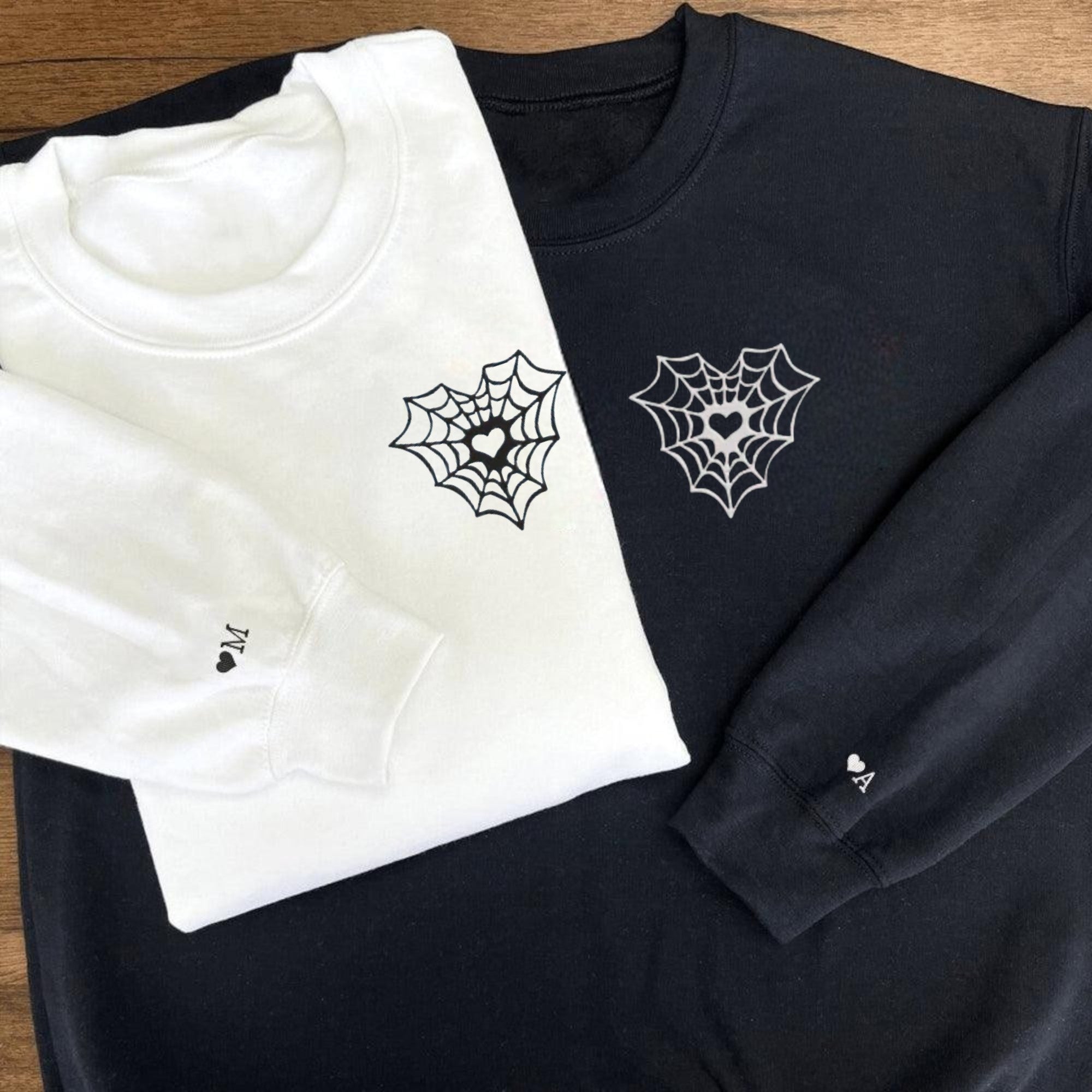 Custom couple matching hoodies with spiderweb heart embroidery

