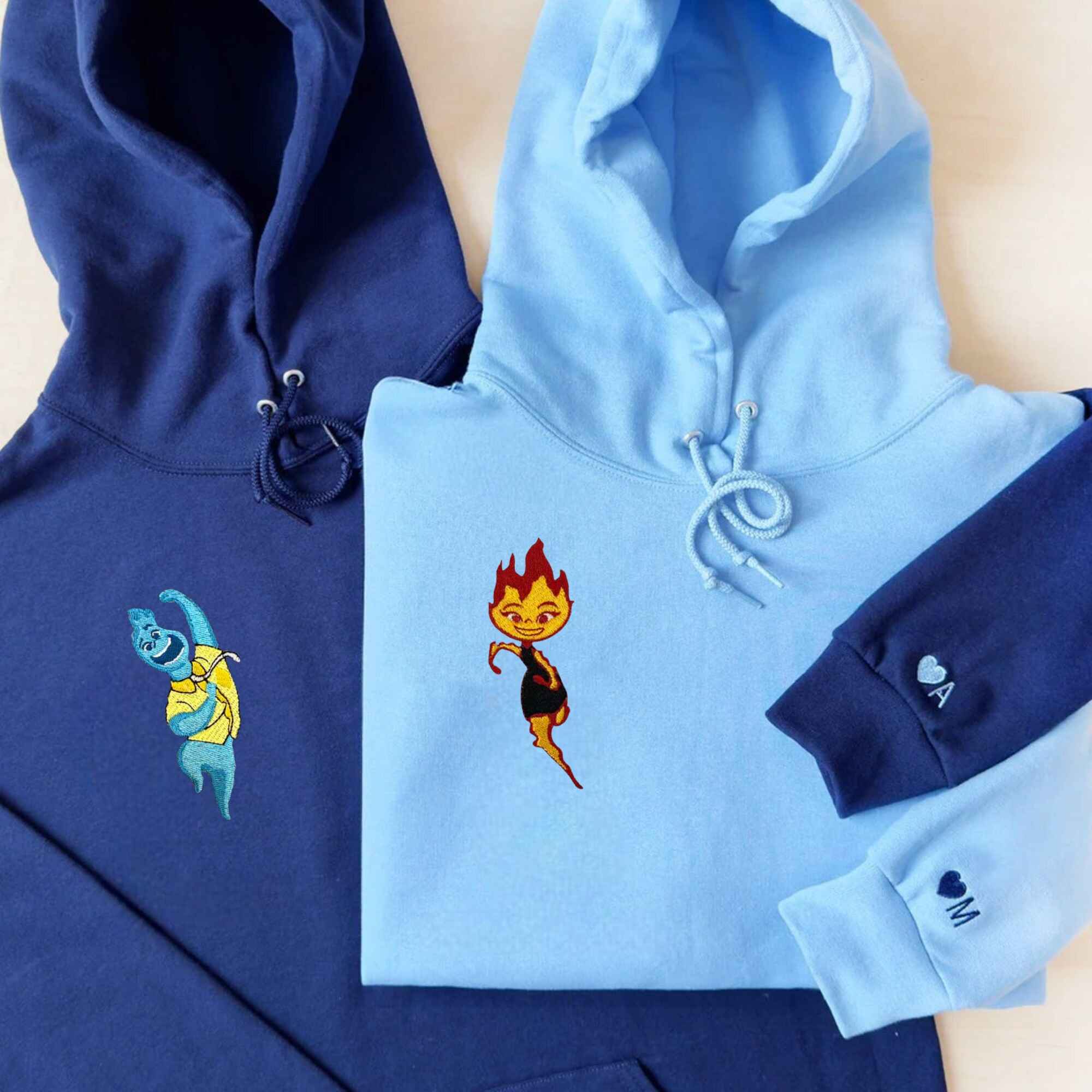 Matching Couple Hoodies featuring playful couples matching hoodies with a fire and water theme.
