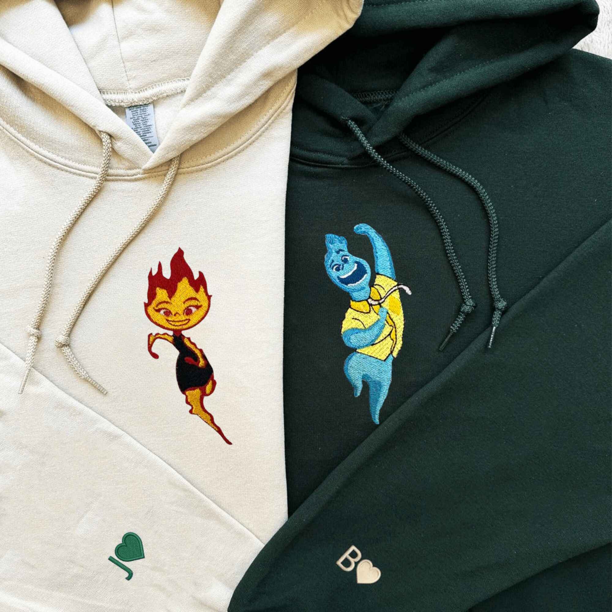 Matching Couple Hoodies with custom embroidered matching couple sweatshirts showcasing fire and water characters.
