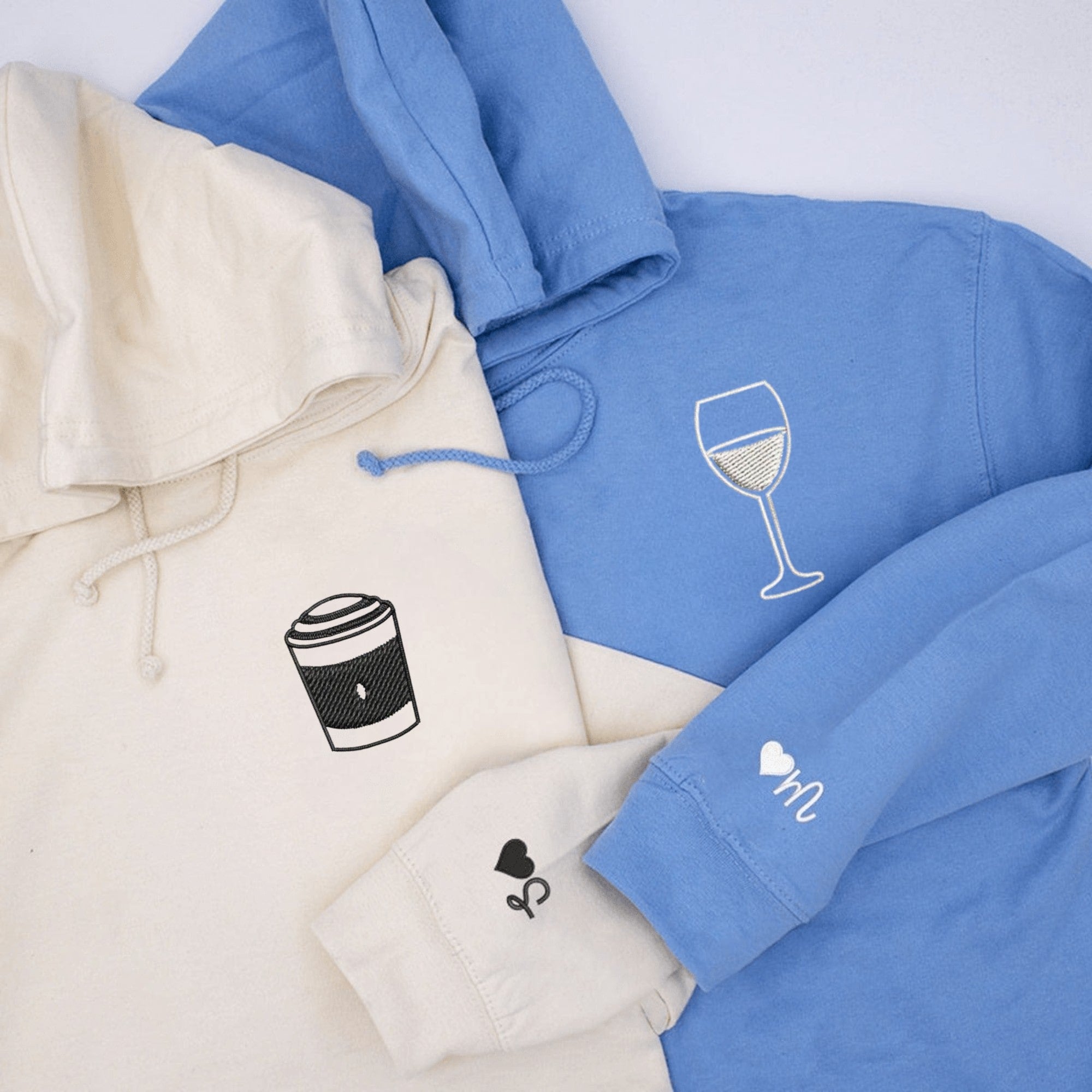 White hoodie with coffee cup design and blue hoodie with wine glass design for couples

