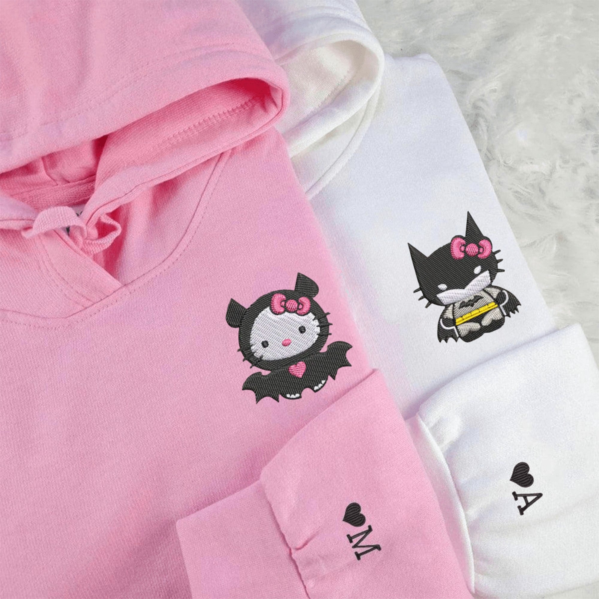 Matching Hello Kitty Bat couple hoodies with cute bat-themed Hello Kitty designs.

