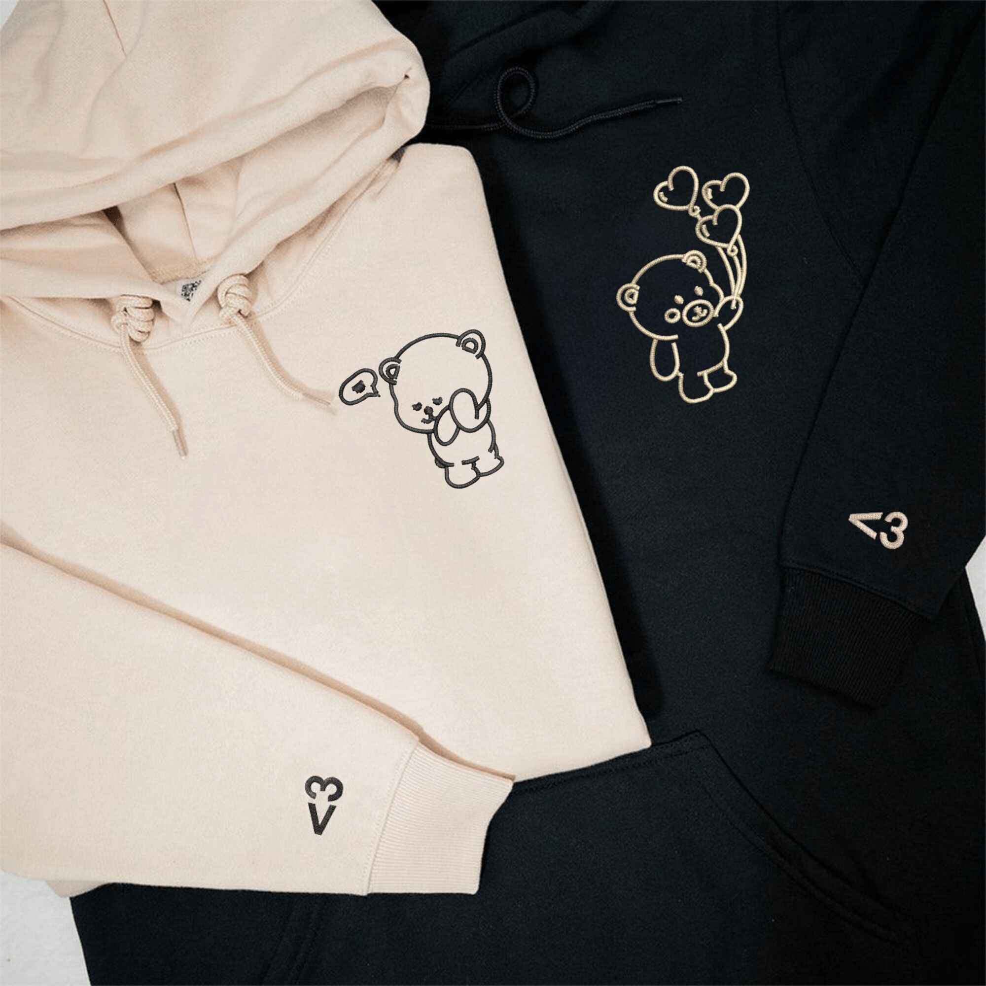 Custom embroidered bear couple hoodies, perfect for anniversary gifts.
