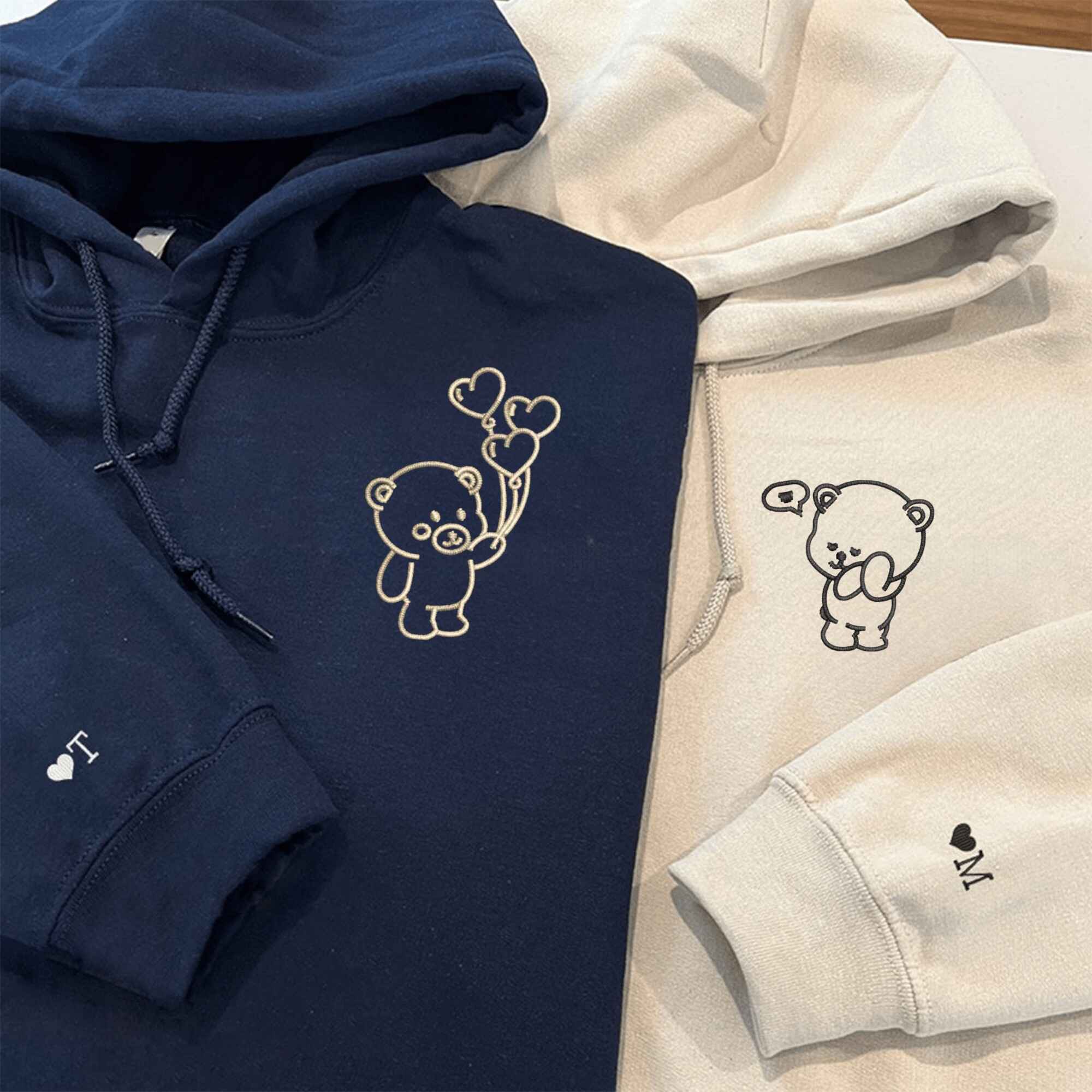 Custom embroidered bear couple hoodies, perfect for anniversary gifts.
