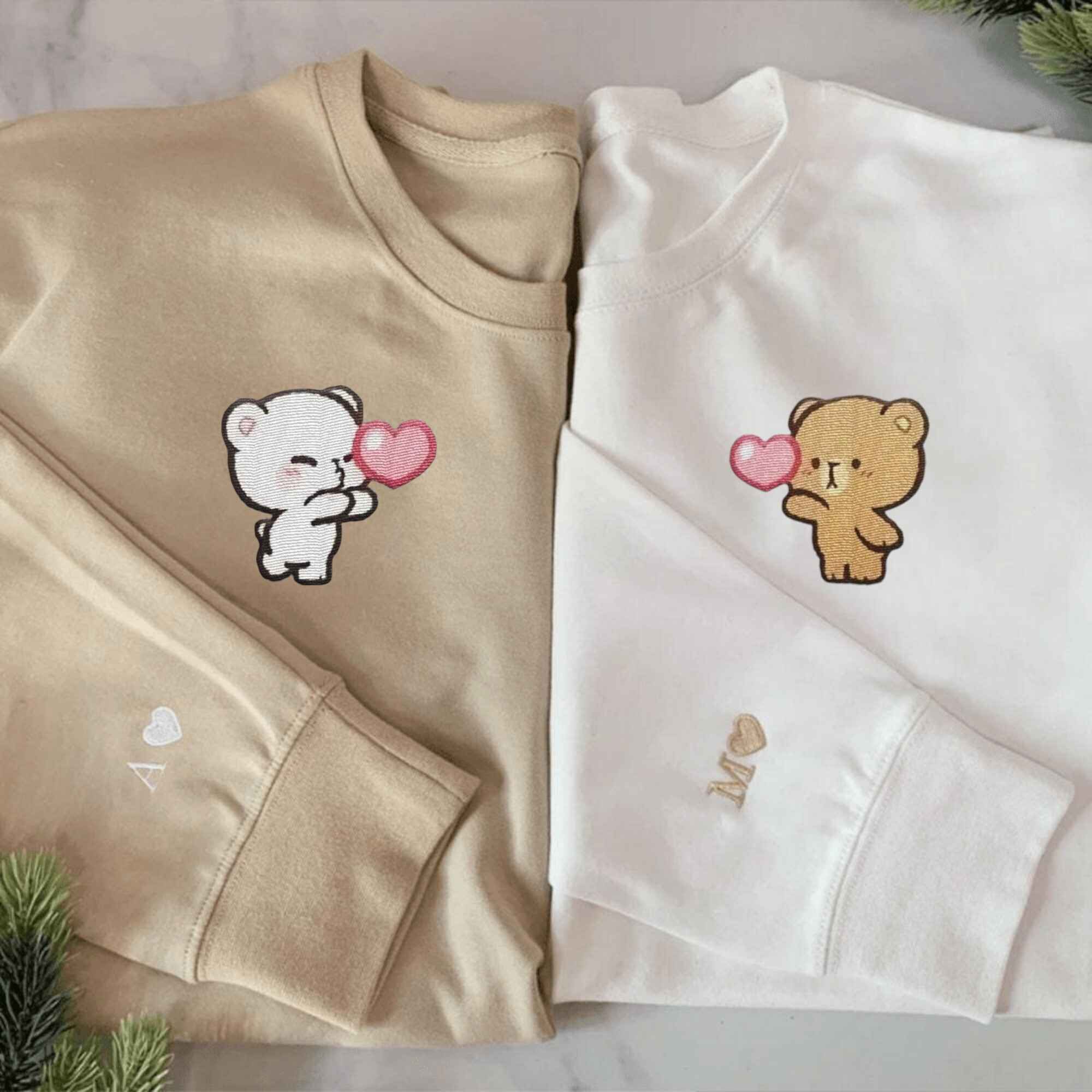 Matching Couple Hoodies with custom embroidered matching couple sweatshirts showcasing playful bear motifs.
