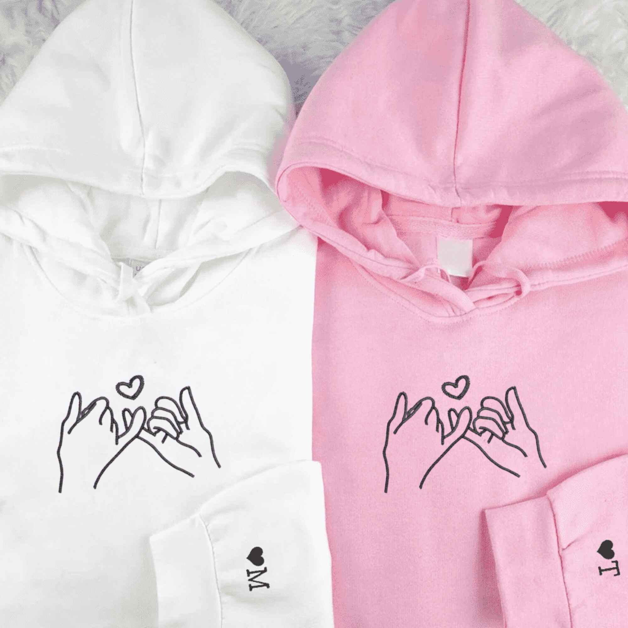 Matching Couple Hoodies with custom embroidered matching couple sweatshirts showcasing a pinky promise motif.
