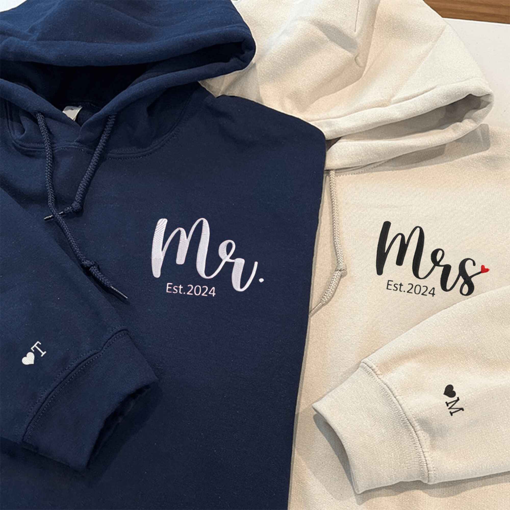 Matching Couple Hoodies with custom embroidered matching couple sweatshirts for newlyweds.
