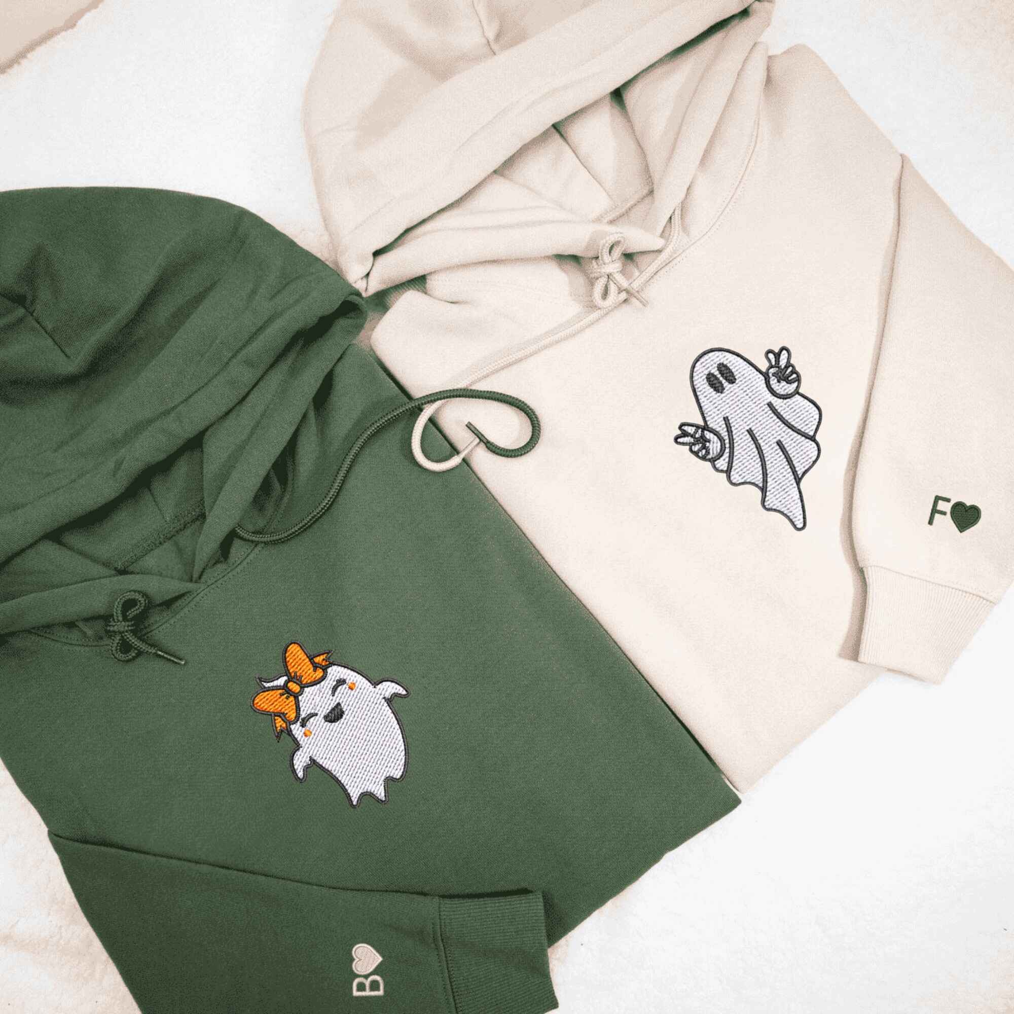 Matching Couple Hoodies with custom embroidered matching couple sweatshirts showcasing playful ghost motifs.
