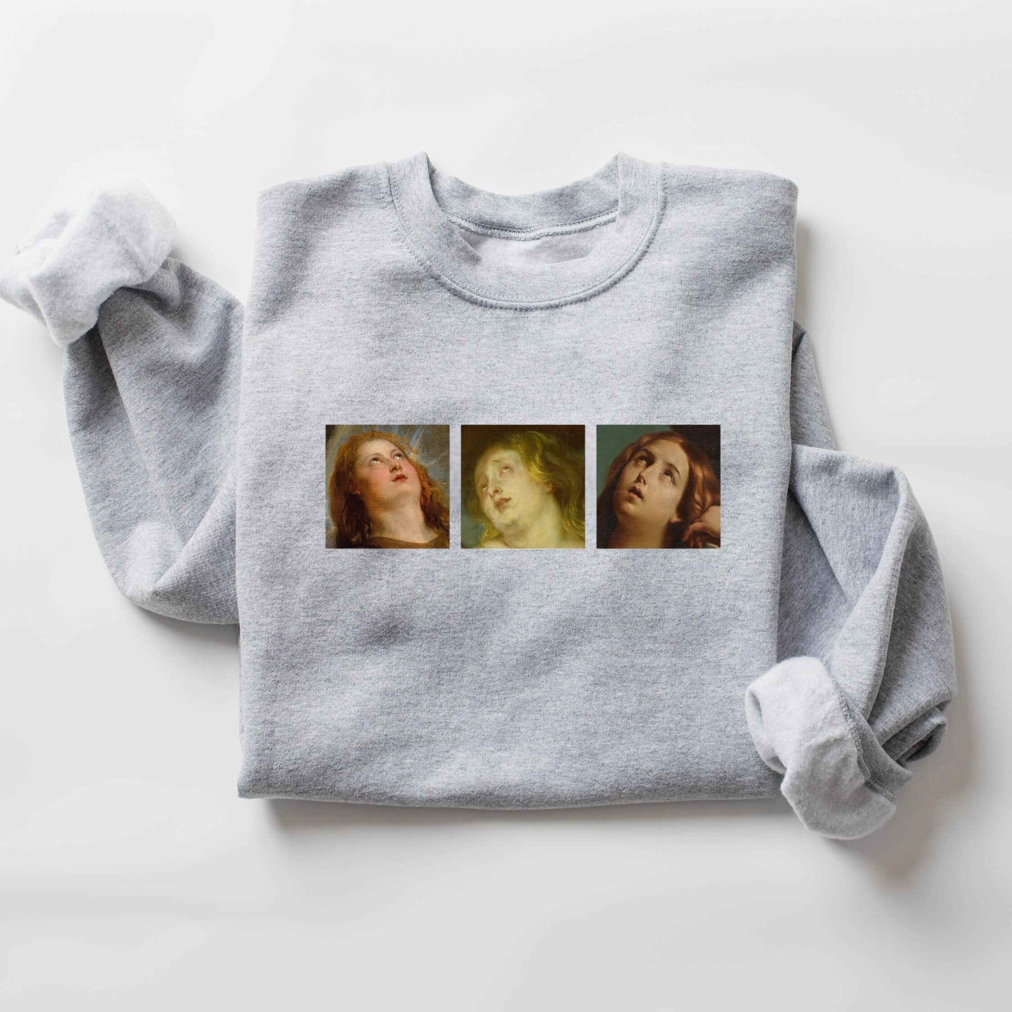 Grey sweatshirt featuring famous Renaissance faces in graphic print