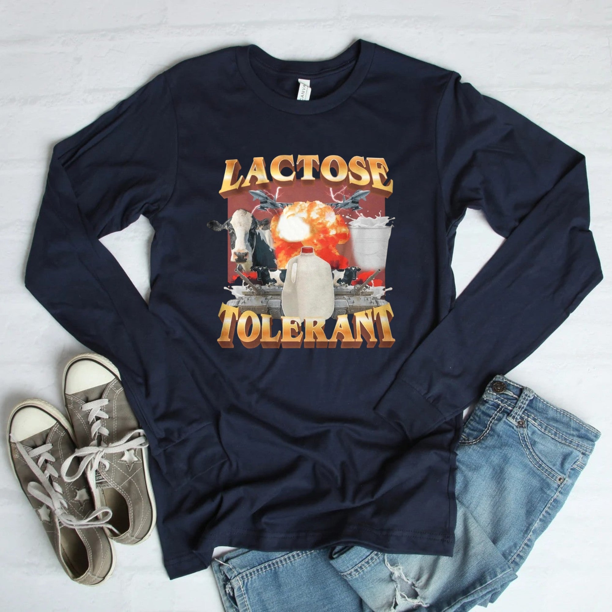 Close-up of "Lactose Tolerant" graphic tee with fun, explosive cow design