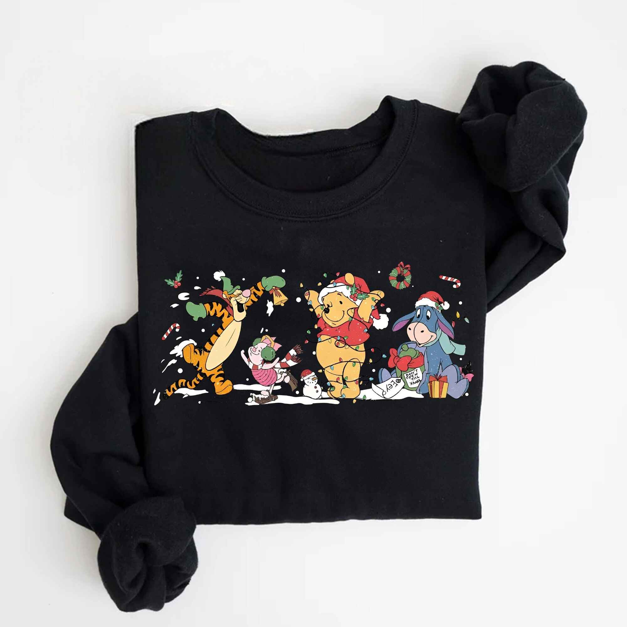 Christmas-themed t-shirt with playful character illustrations
