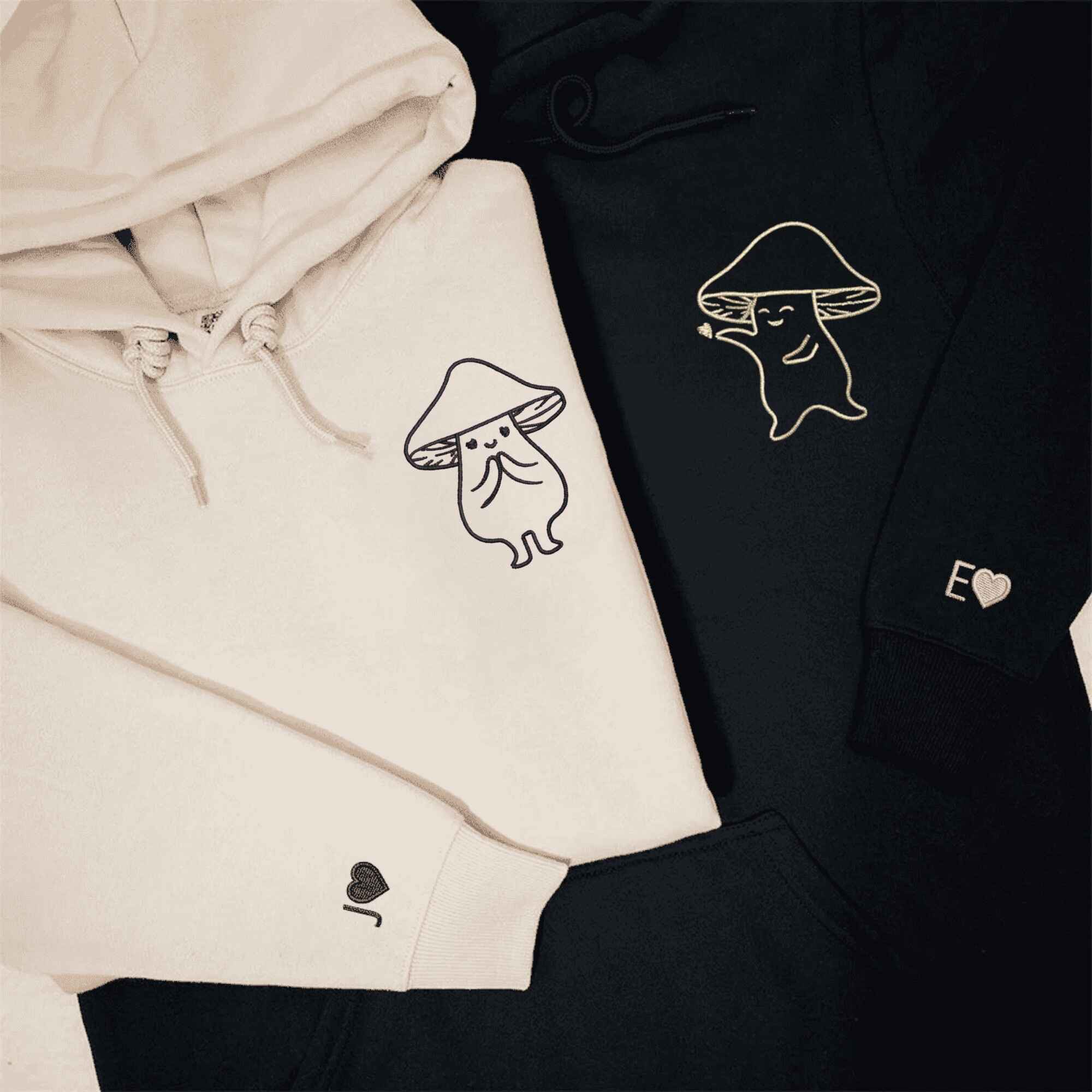 Matching Couple Hoodies with custom embroidered matching couple sweatshirts showcasing quirky mushroom motifs.
