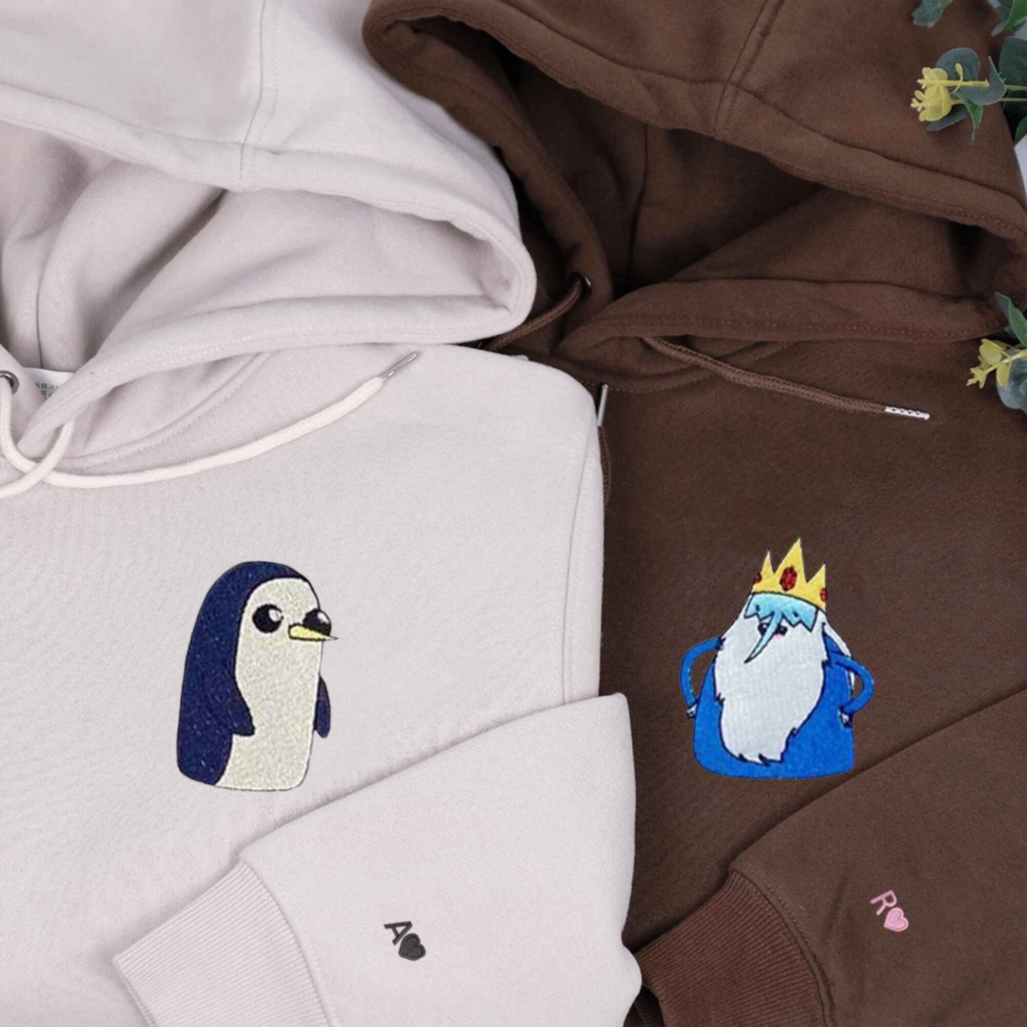 Matching couple hoodies featuring cute penguin designs for playful duos.
