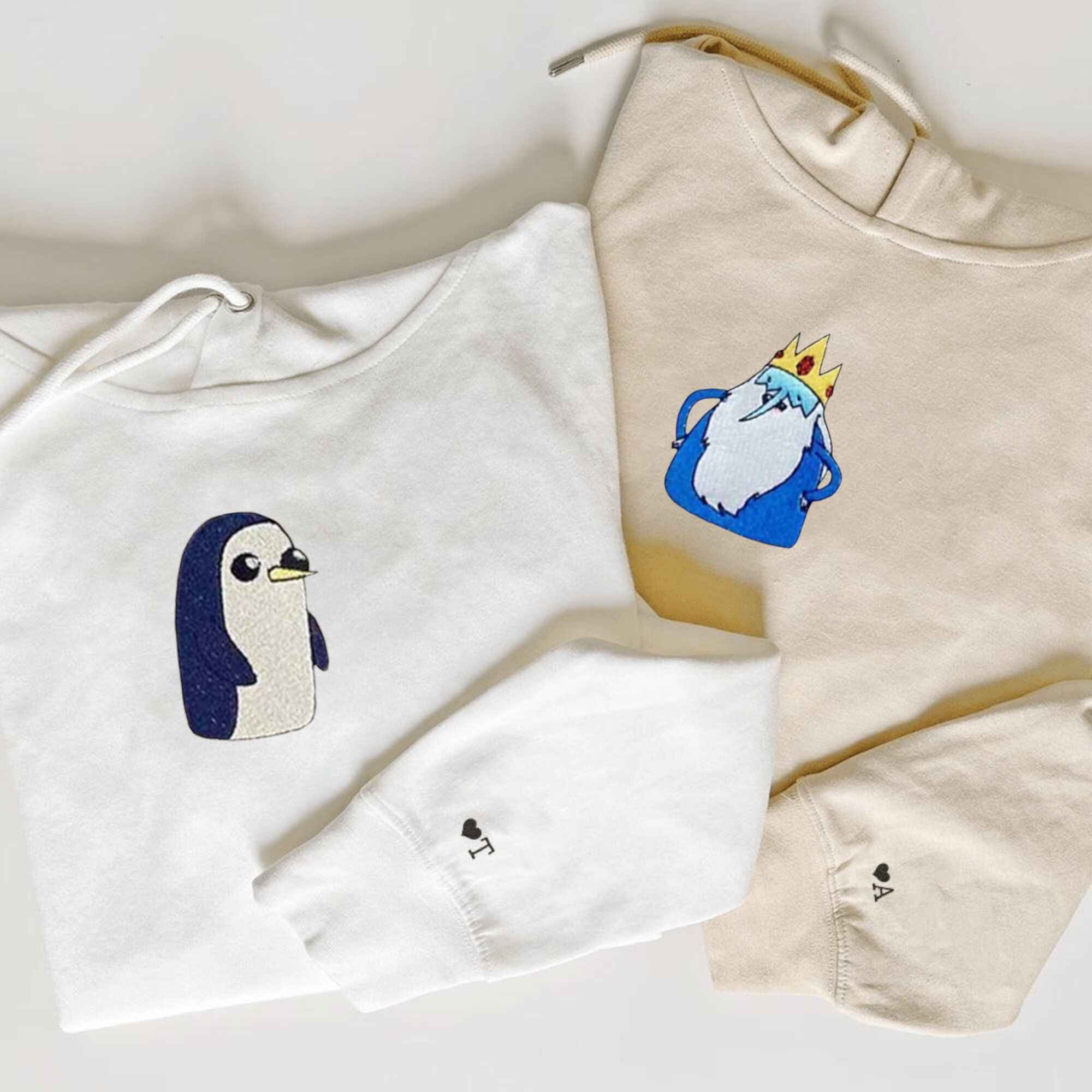 Custom embroidered penguin couple hoodies, perfect for adorable matching outfits.
