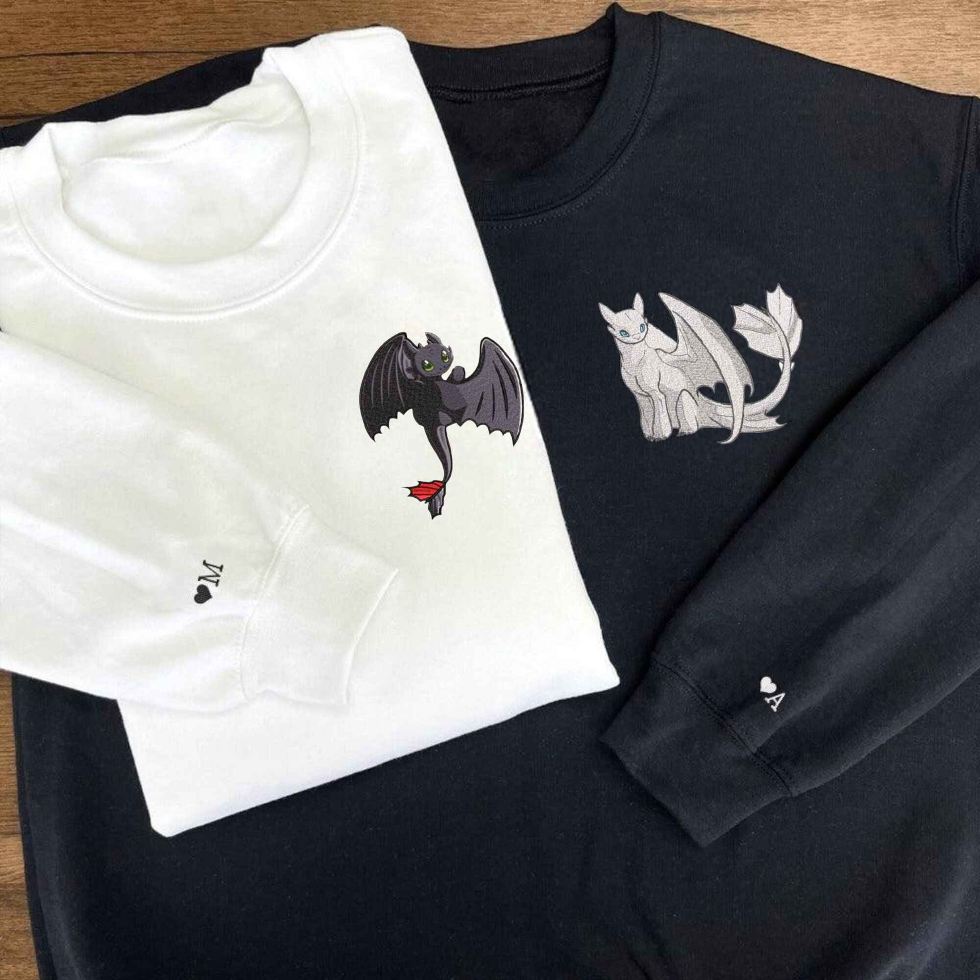 Toothless and Light Fury embroidered sweatshirts for couples.
