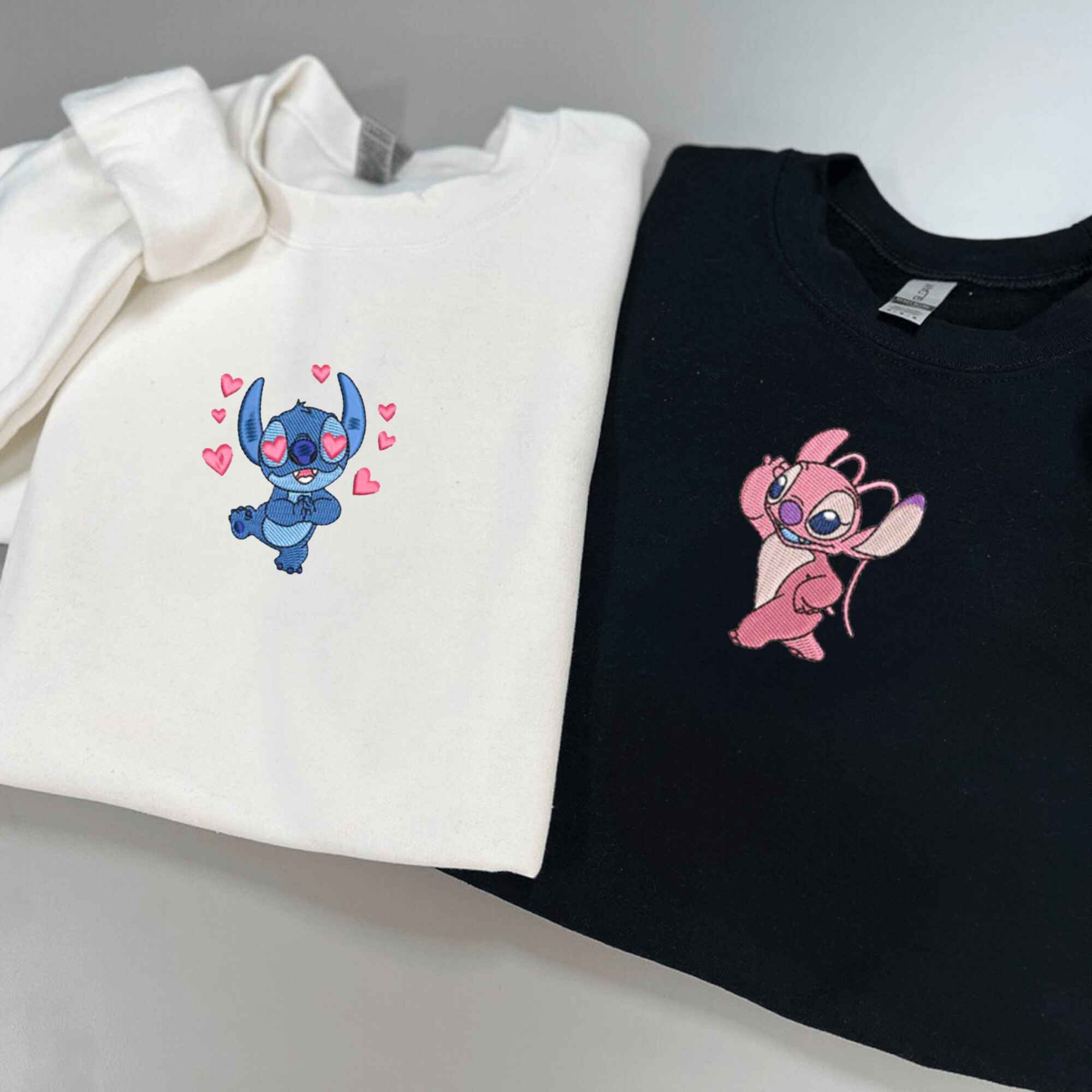 Cute embroidered sweatshirts featuring Stitch and Angel.
