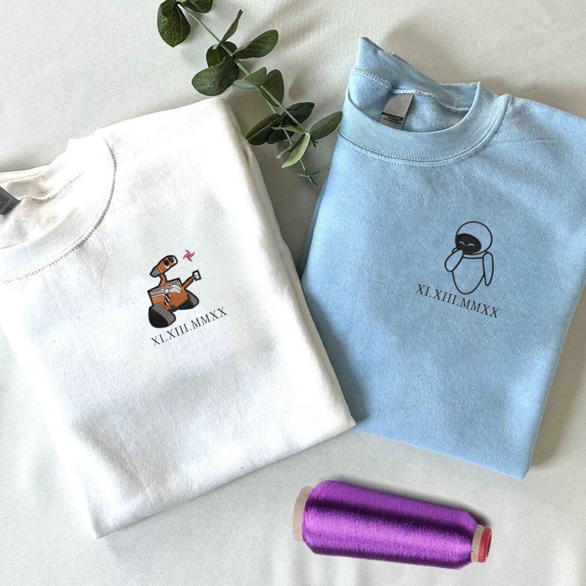 Wall-E and Eve custom embroidered couple hoodies for a perfect match.
