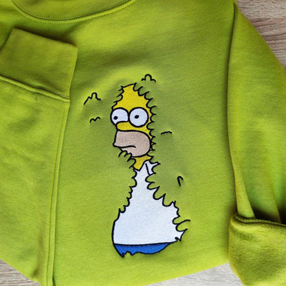 Meme shirt featuring a green hoodie with detailed embroidery of a famous cartoon character, ideal for meme lovers and quirky fashion styles.





