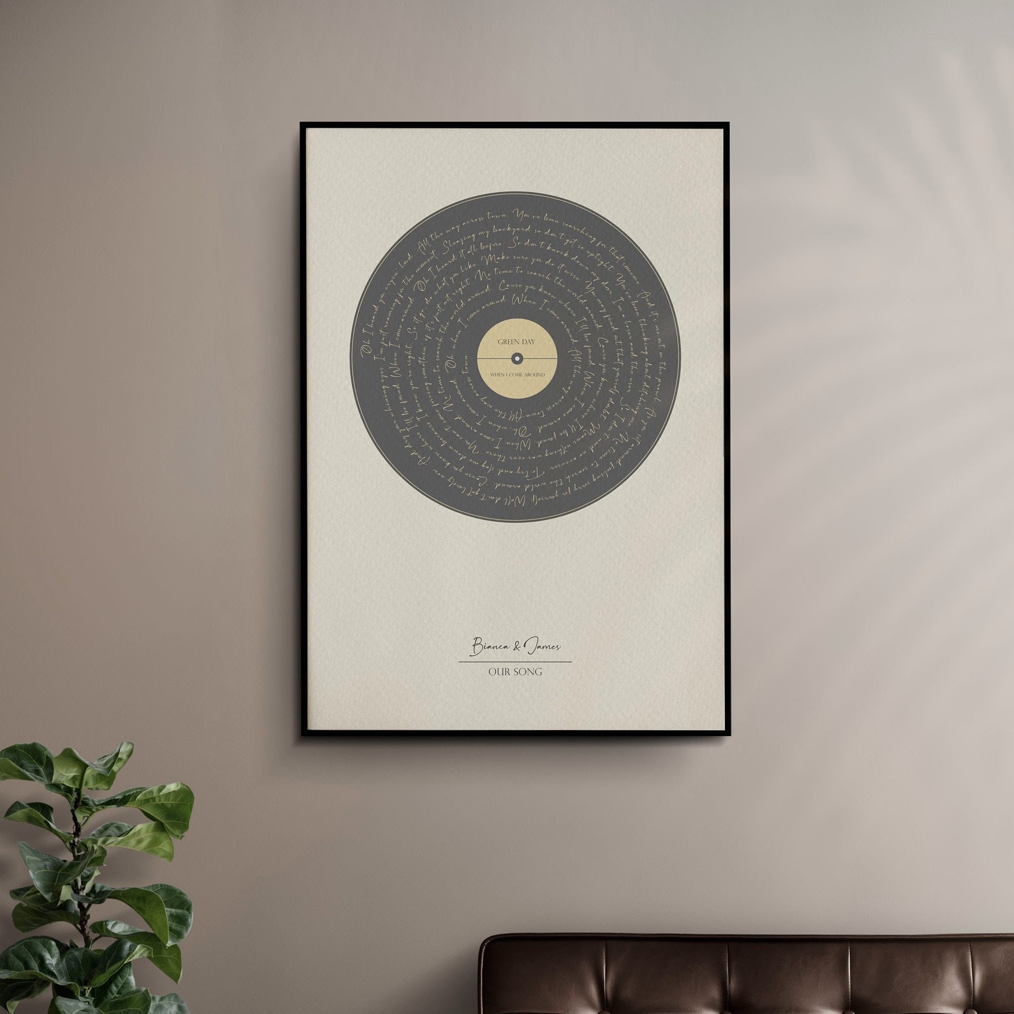 Custom vinyl record song lyrics wall art featuring personalized song and couple's names

