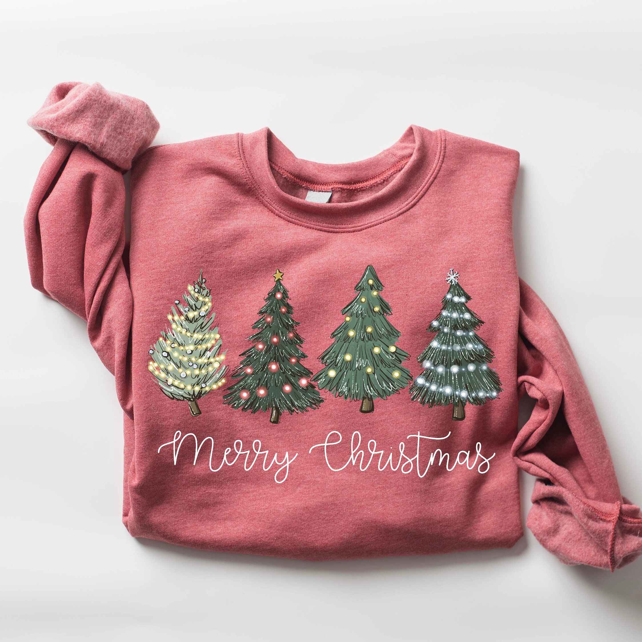 Festive Christmas sweatshirt featuring illuminated trees, various colors available
