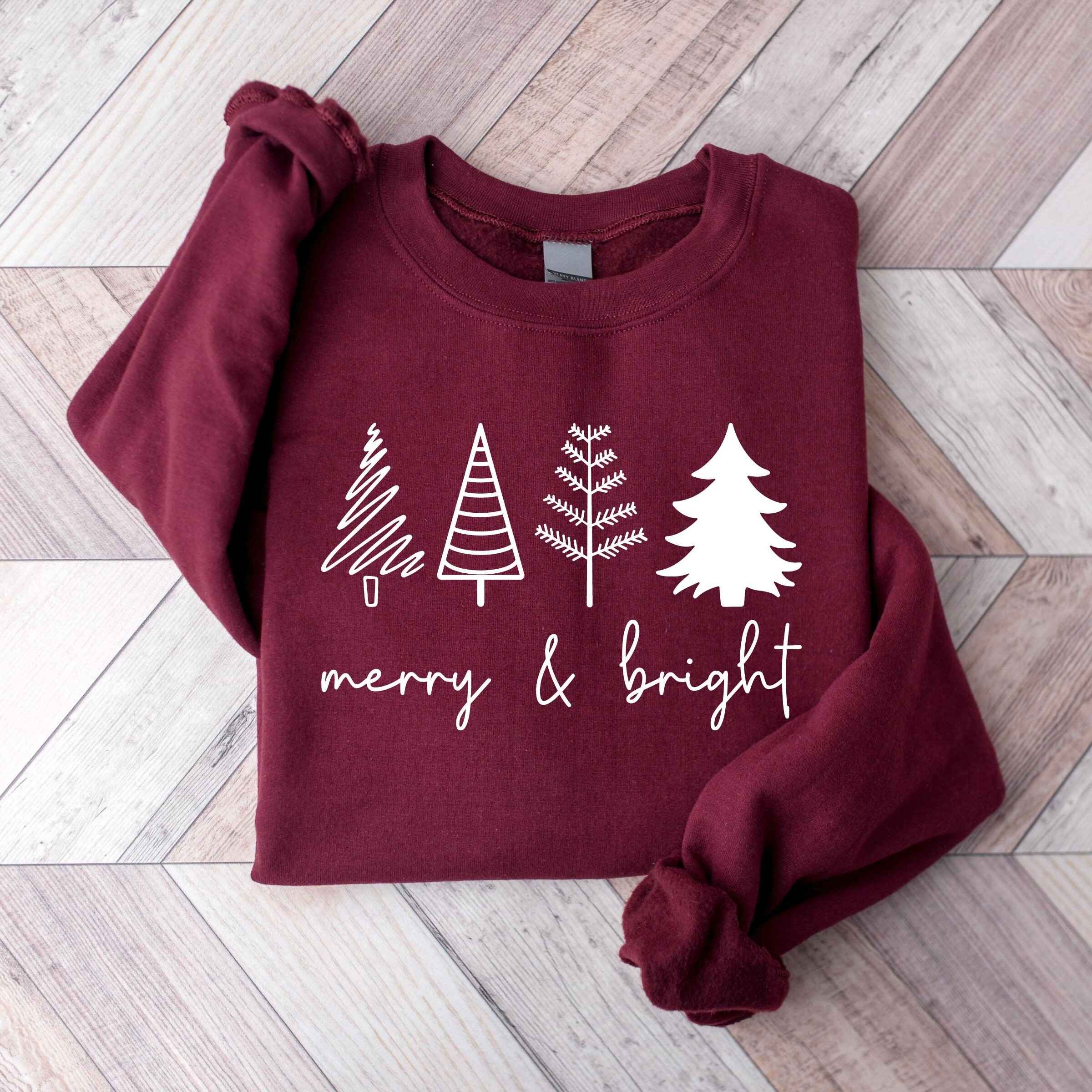 Burgundy "Merry & Bright" Christmas sweatshirt with holiday trees
