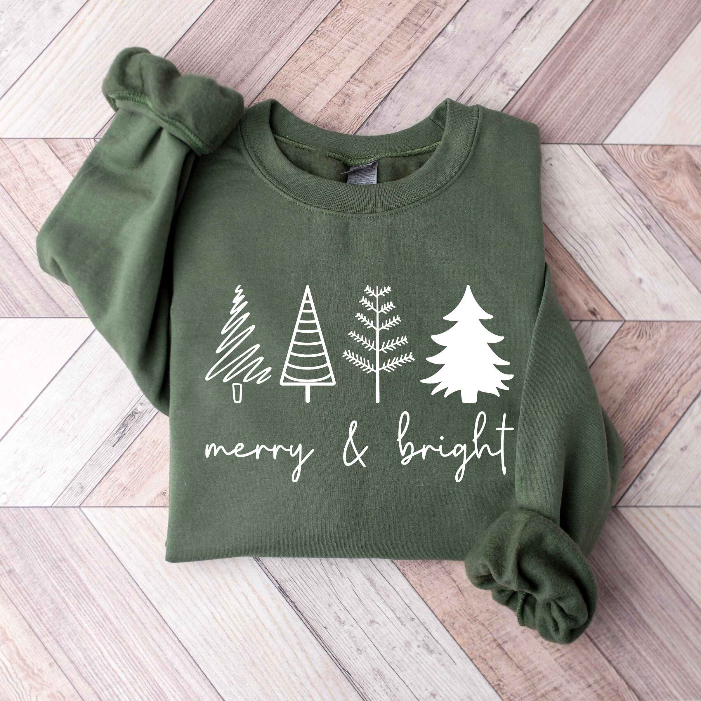 Cozy Christmas sweatshirt featuring festive tree design
