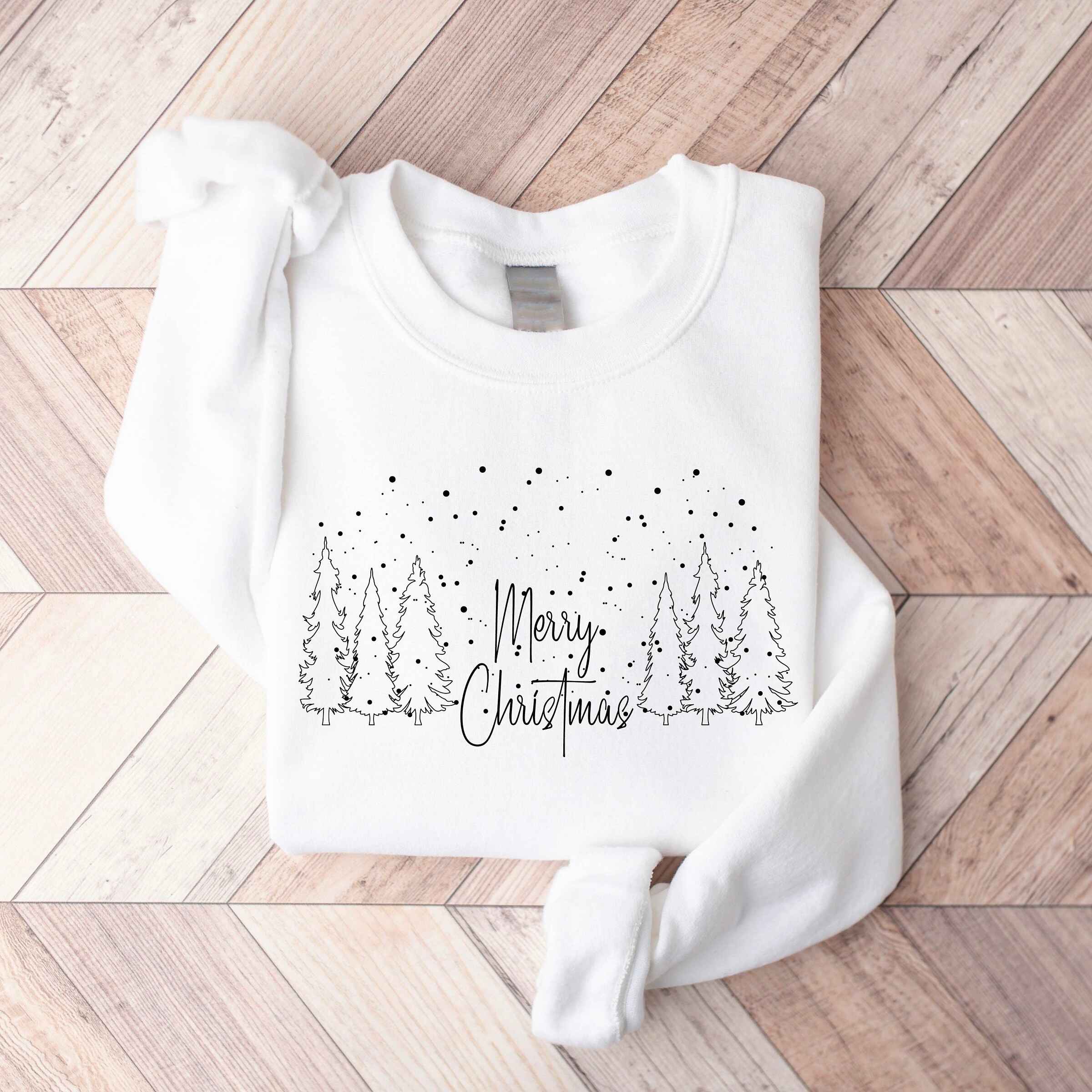 Burgundy "Merry Christmas" sweatshirt with forest and snow design
