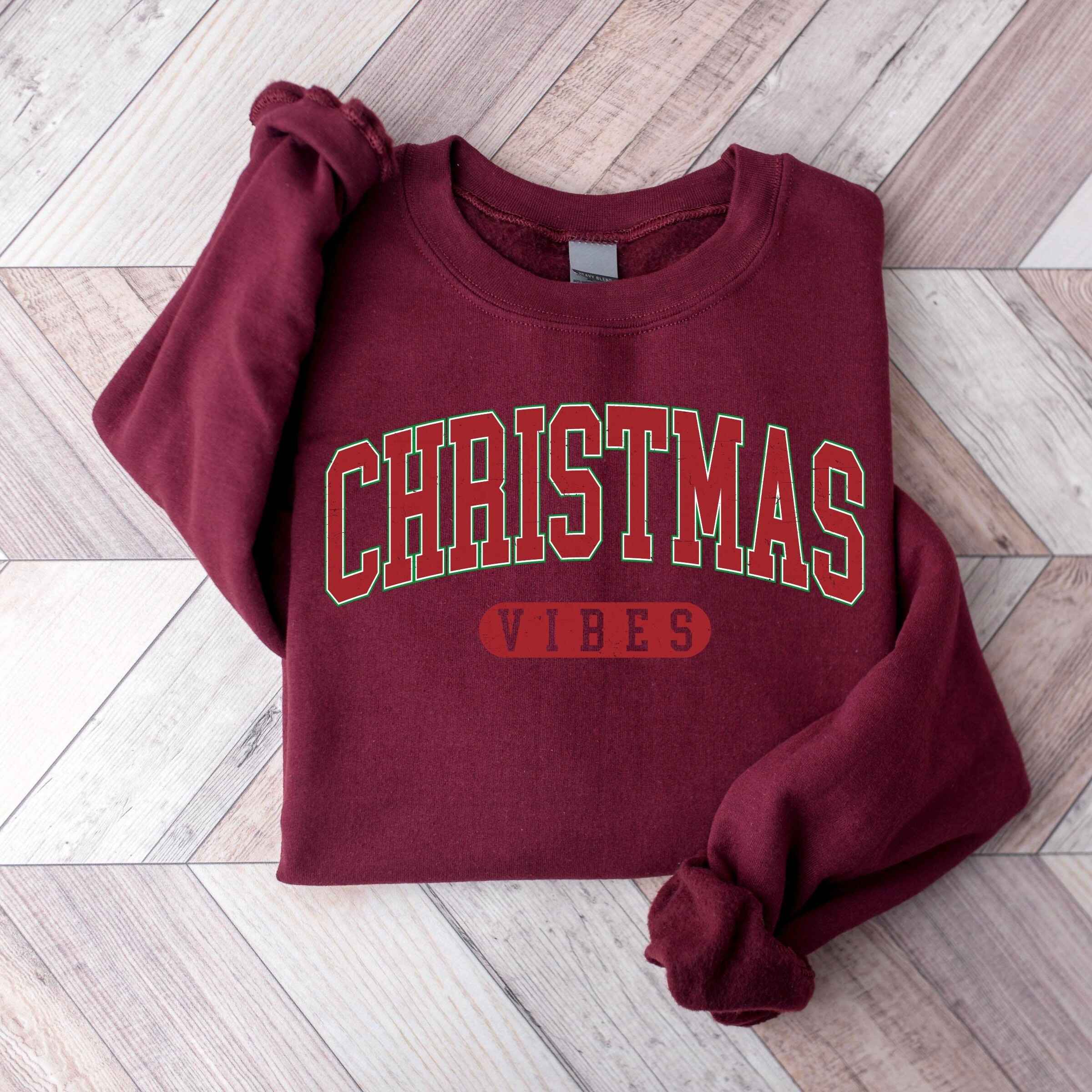 Christmas-themed sweatshirt with "Christmas Vibes" design
