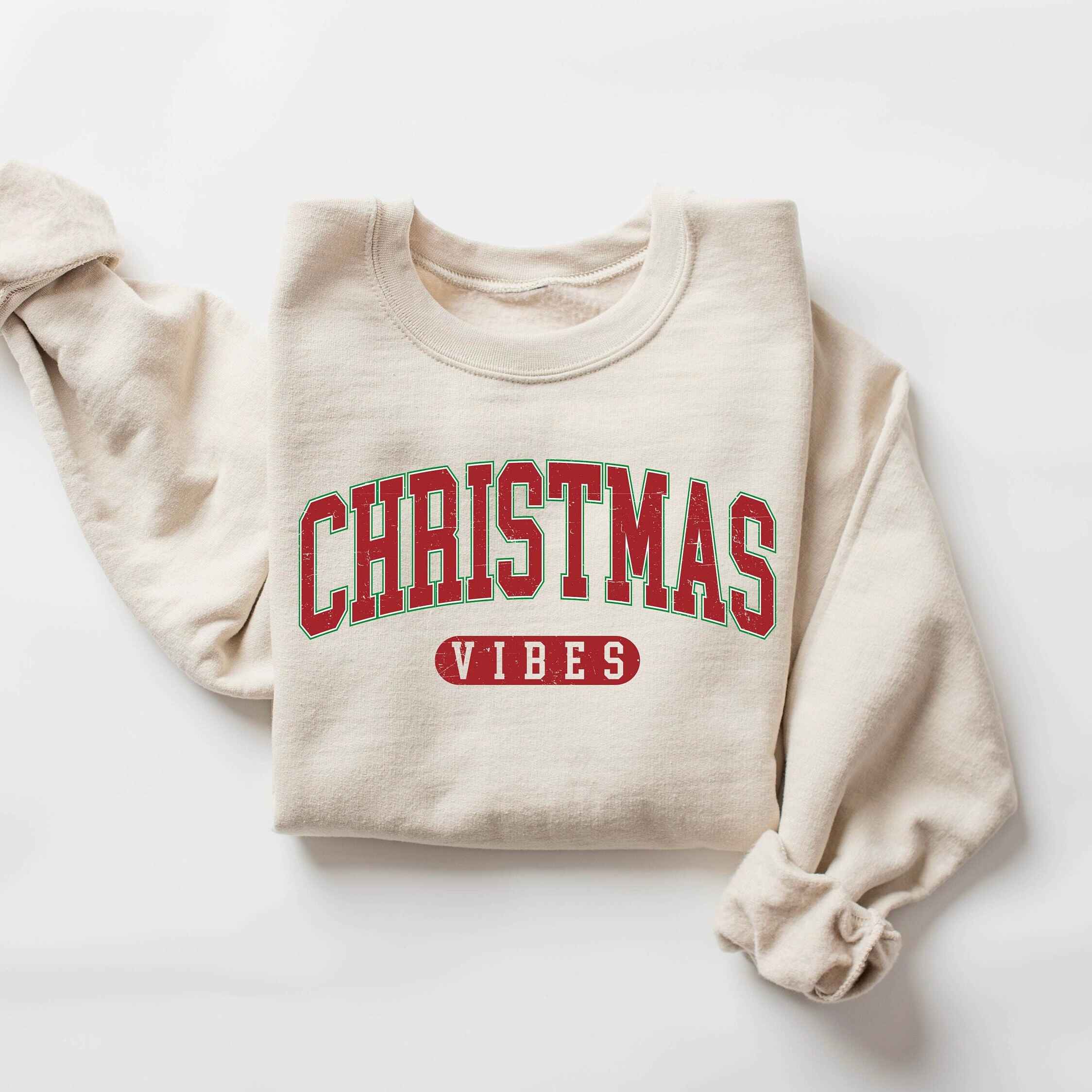 Christmas-themed sweatshirt with "Christmas Vibes" design
