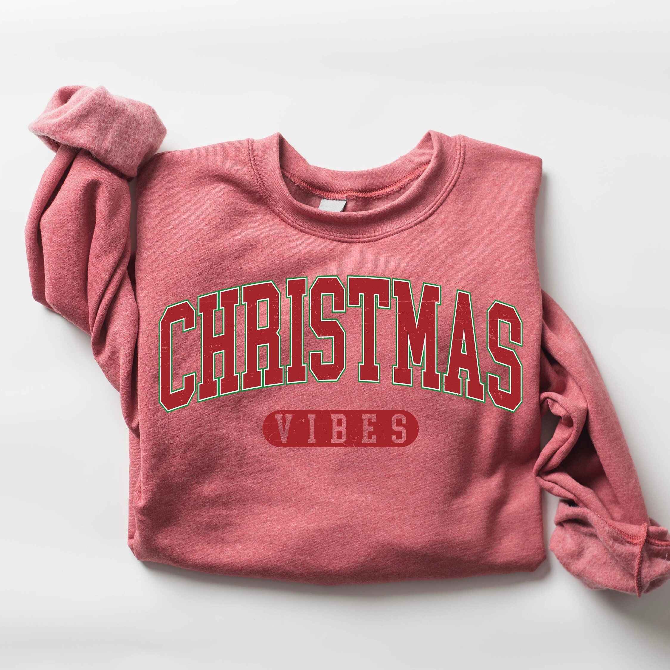 Holiday sweatshirt with bold Christmas Vibes text
