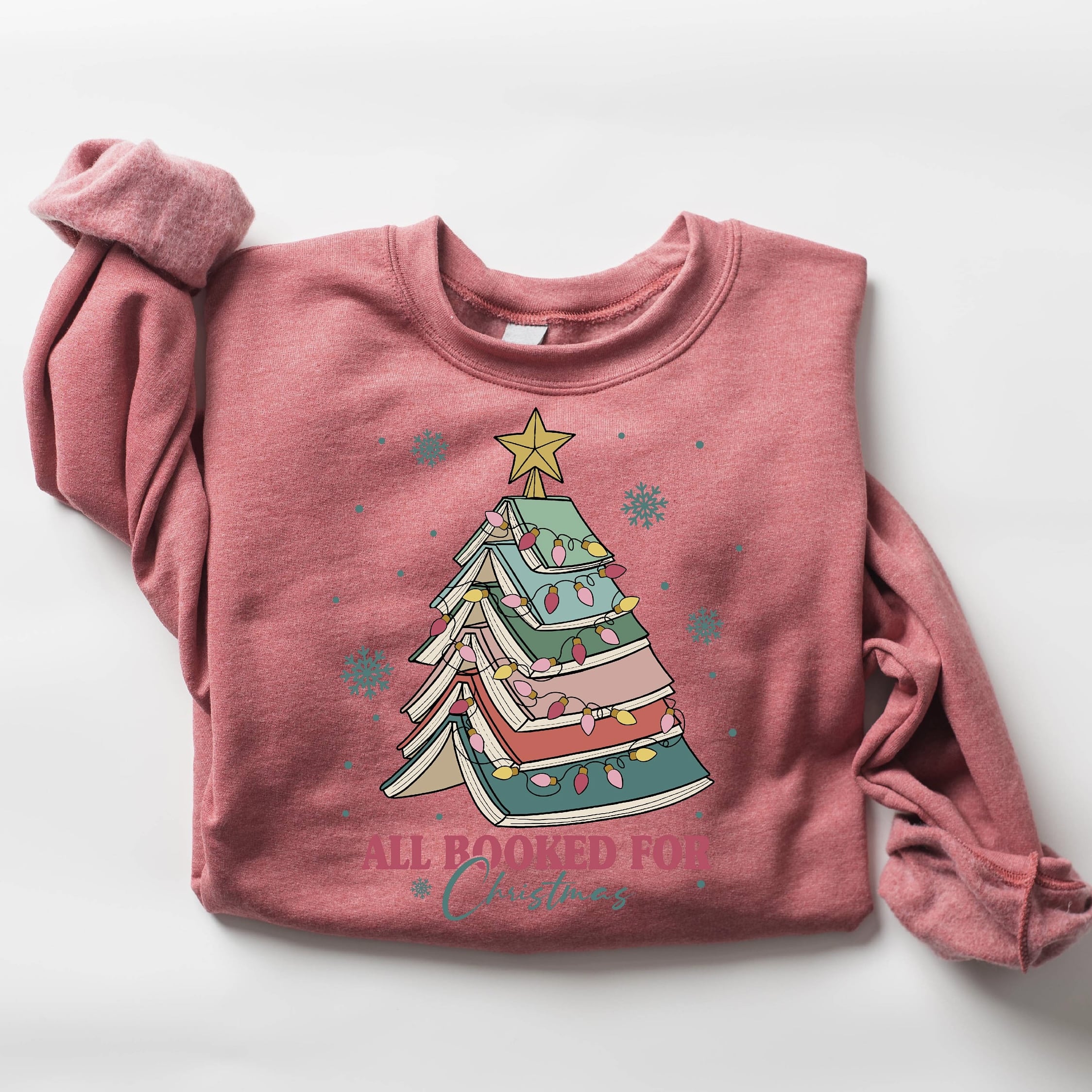 Customizable Christmas sweatshirt for book lovers with festive decor
