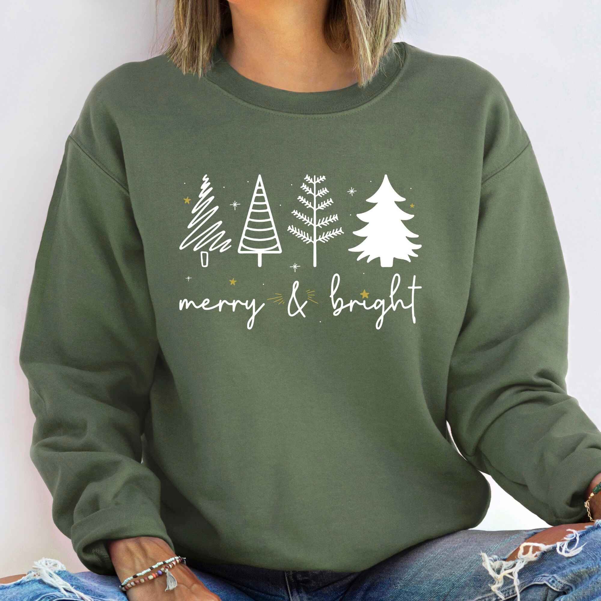 Cozy Christmas sweatshirt featuring festive tree design
