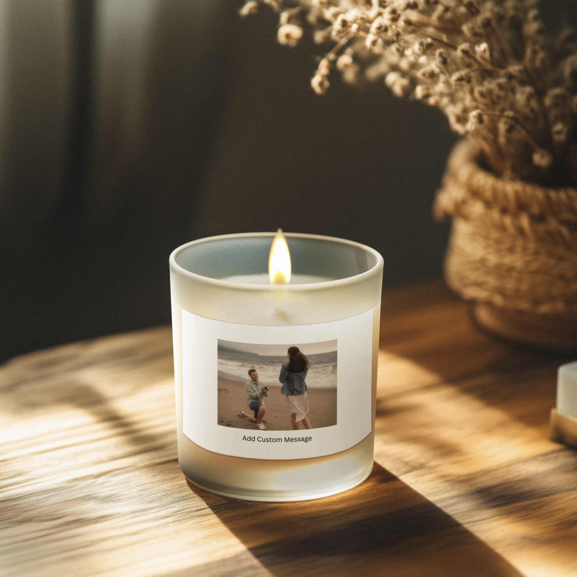 Custom frosted glass candle with personalized photo on the label.